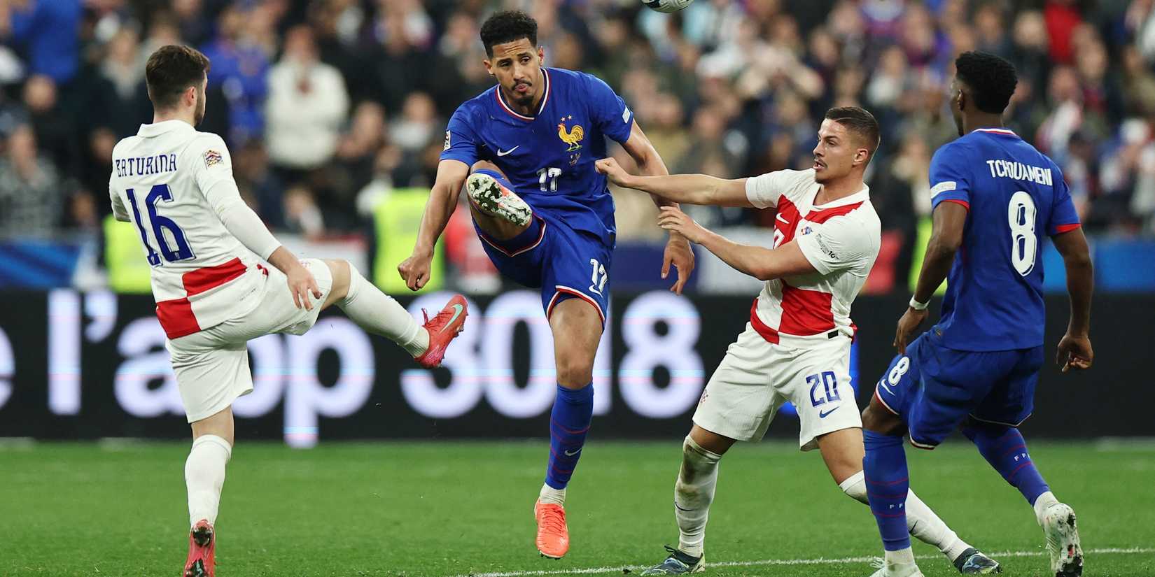 France's William Saliba and Aurelien Tchouameni in action with Croatia's Martin Baturina and Franjo Ivanovic 