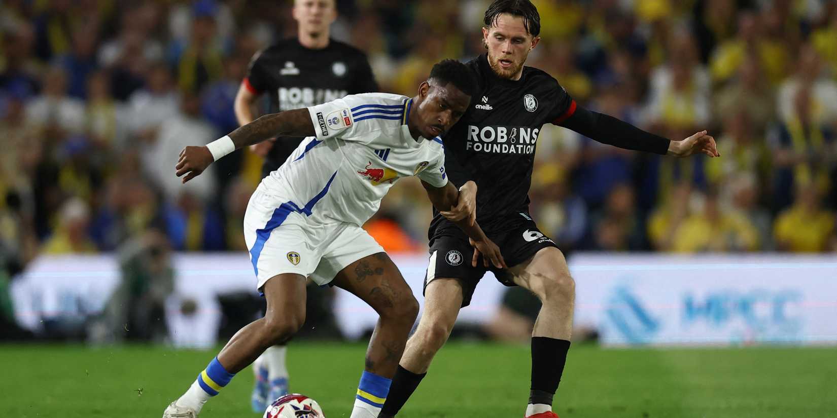 Leeds United's Junior Firpo in action with Bristol City's Max Bird