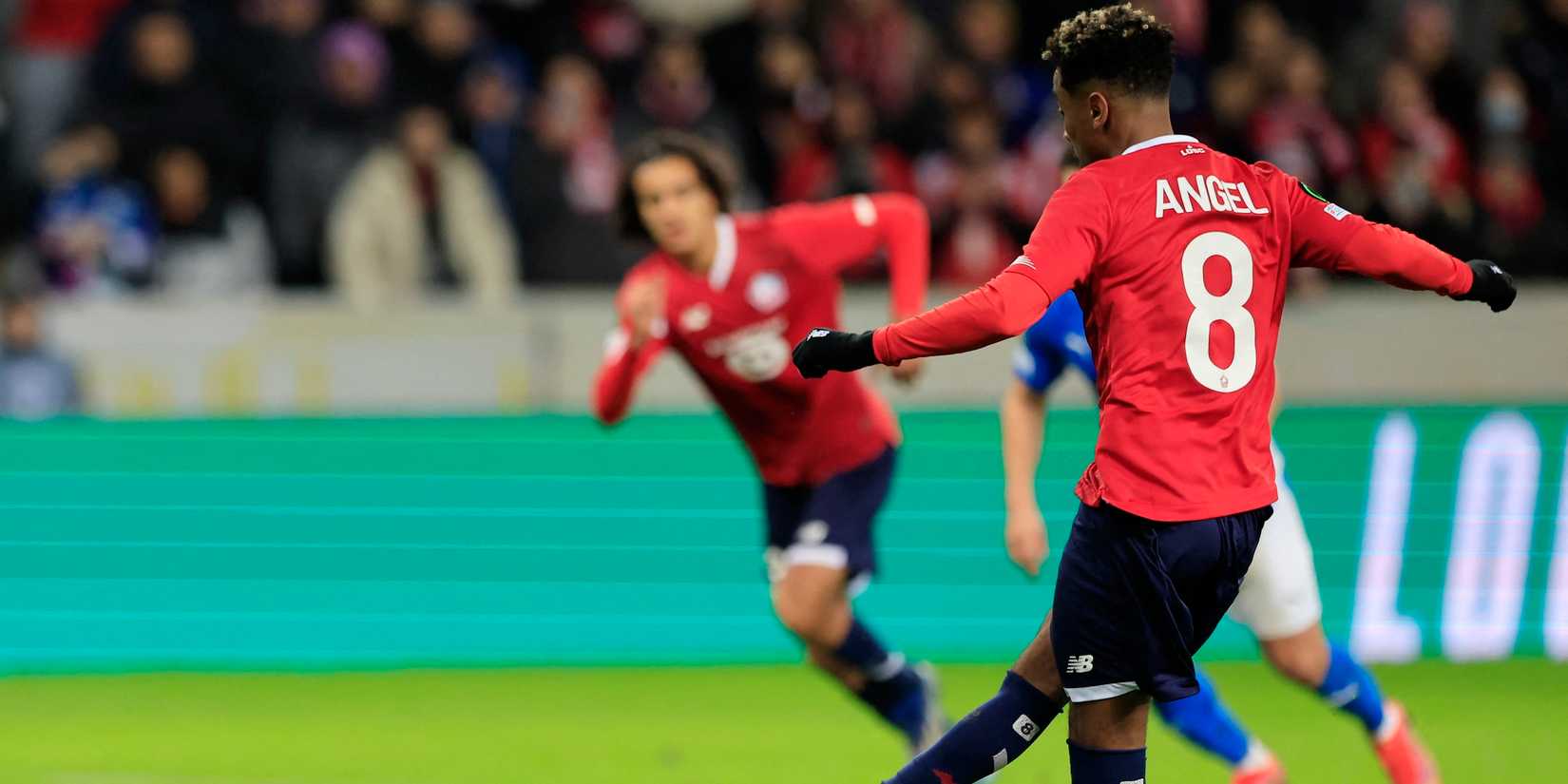 Lille's Angel Gomez scored their second goal from the penalty spot