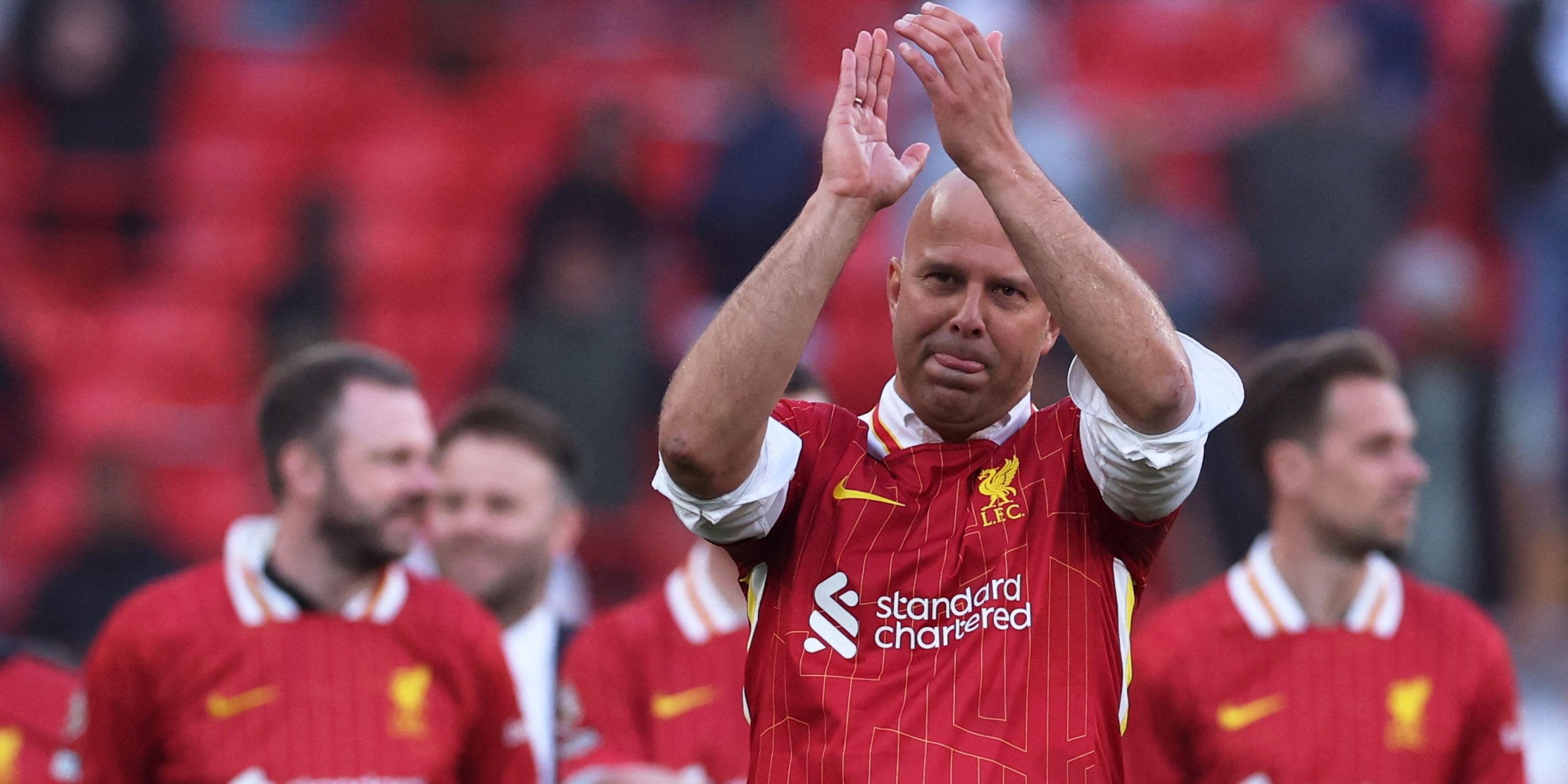 Liverpool manager ARNE Slot celebrates after winning the Premier League