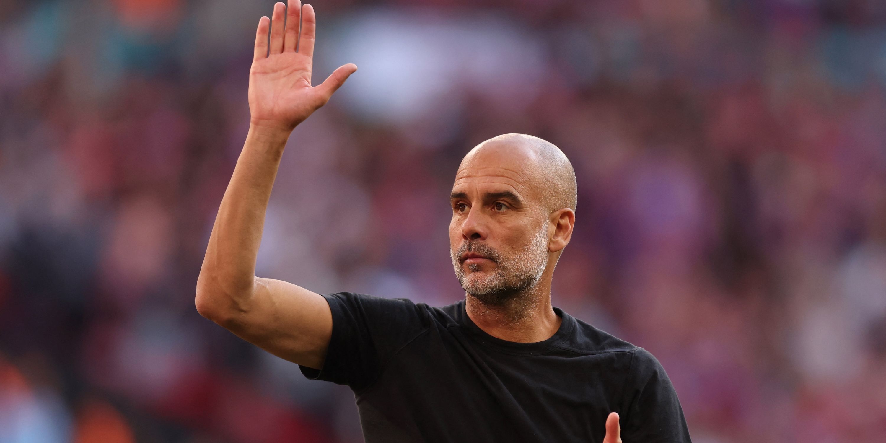 Manchester City City director Pep Guardiola appears depressed after the match