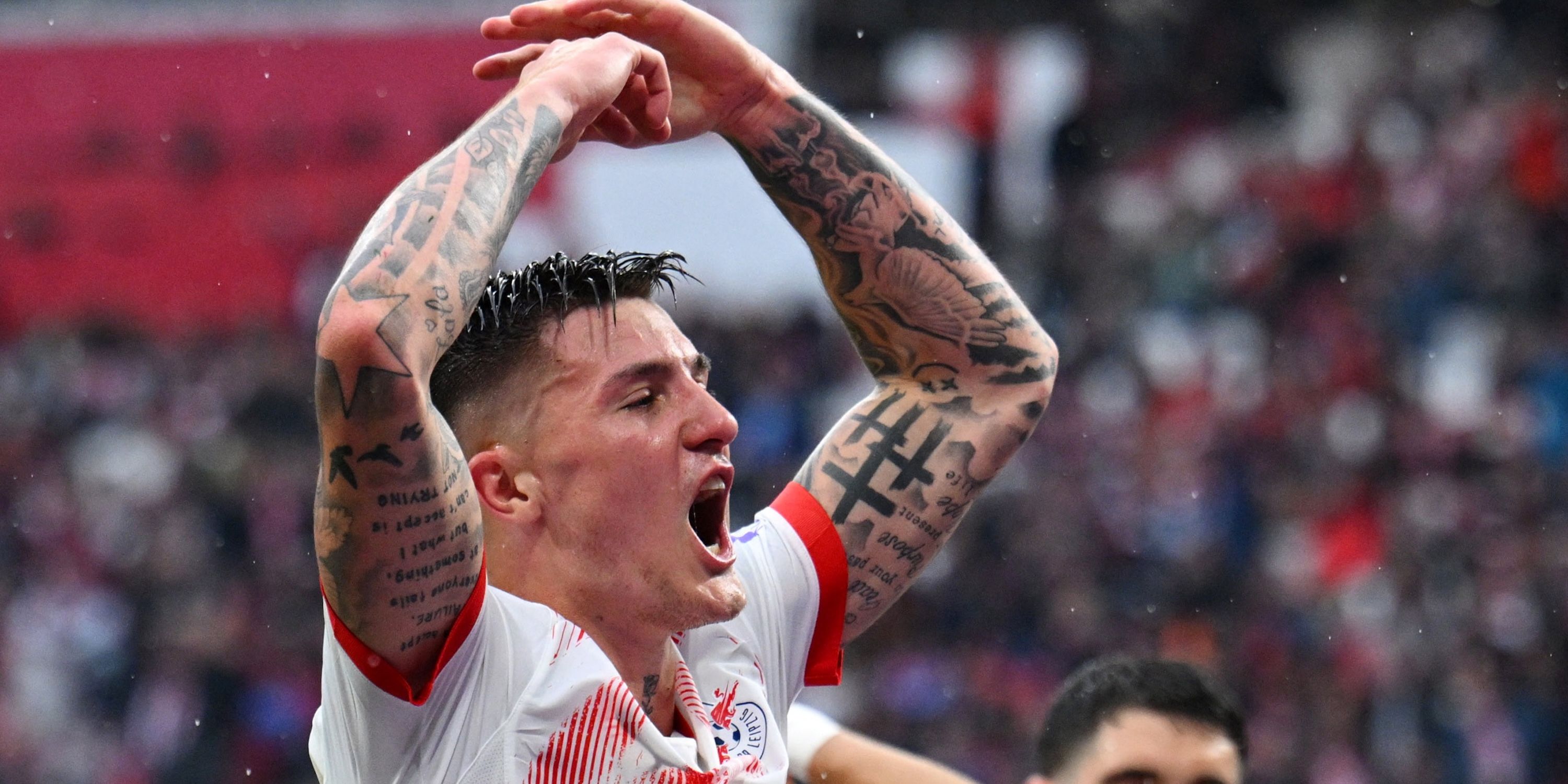 RB Leipzig's Benjamin Sesco notes