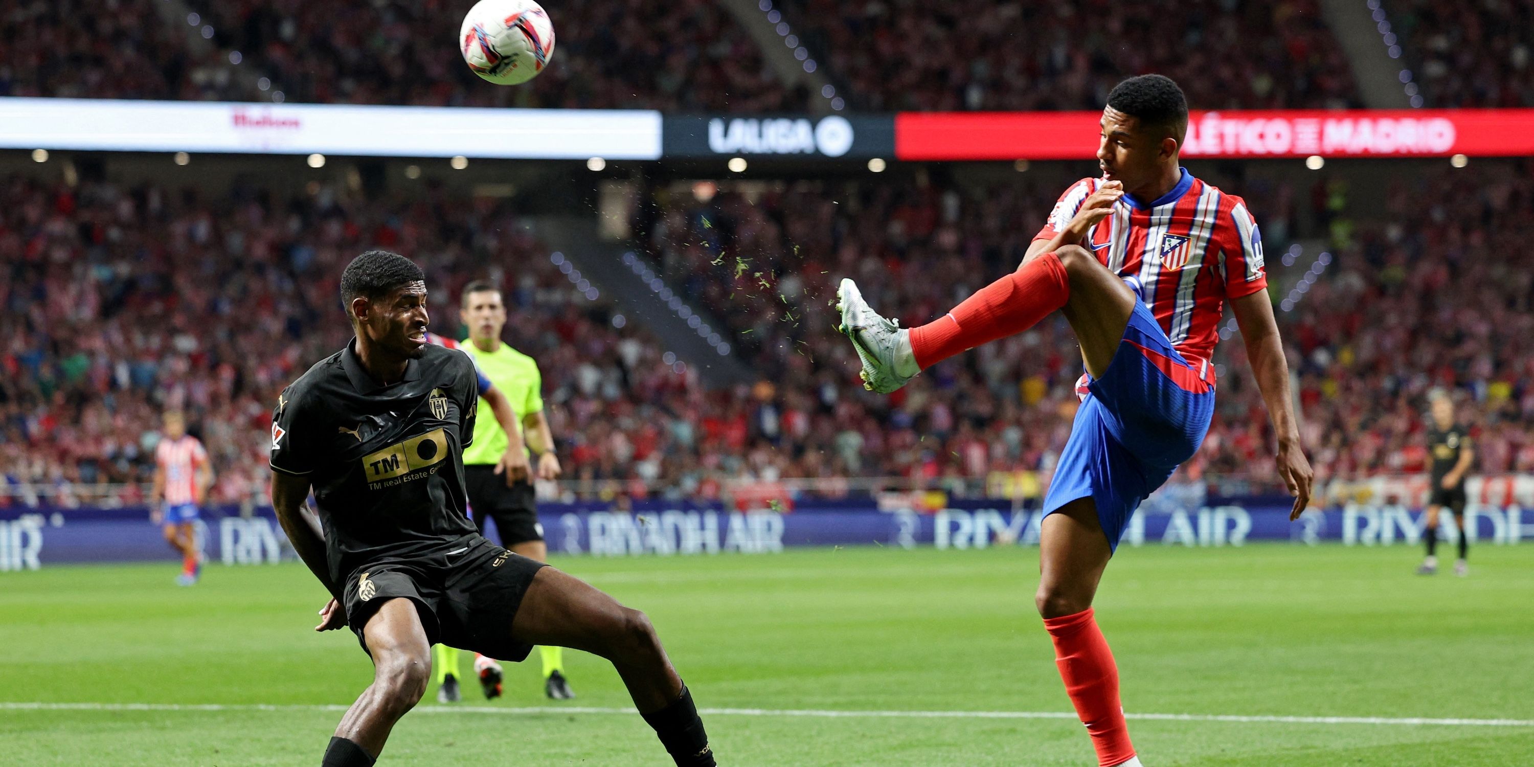Cristhian Mosquera of Valencia acts with Atletico Madrid's Samuel Lino