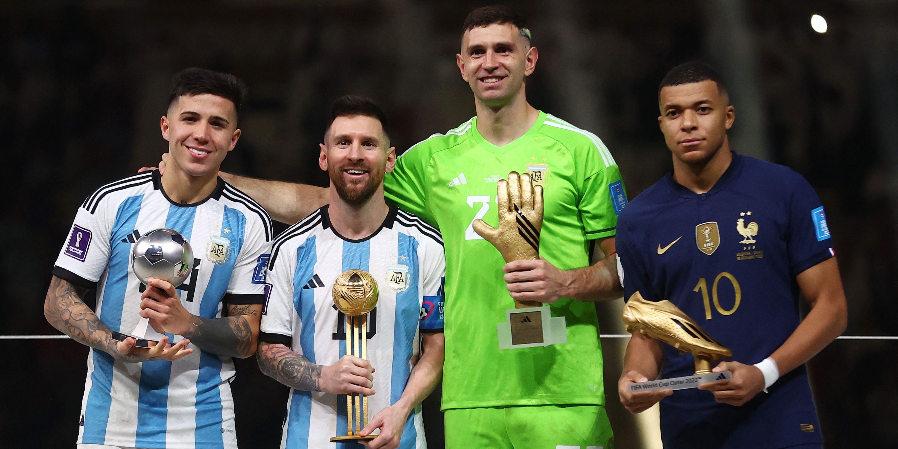 Best Young Player winner Argentina's Enzo Fernandez, Golden Ball winner Argentina's Lionel Messi, Golden Glove winner Argentina's Emiliano Martinez and Golden Boot winner France's Kylian Mbappe pose