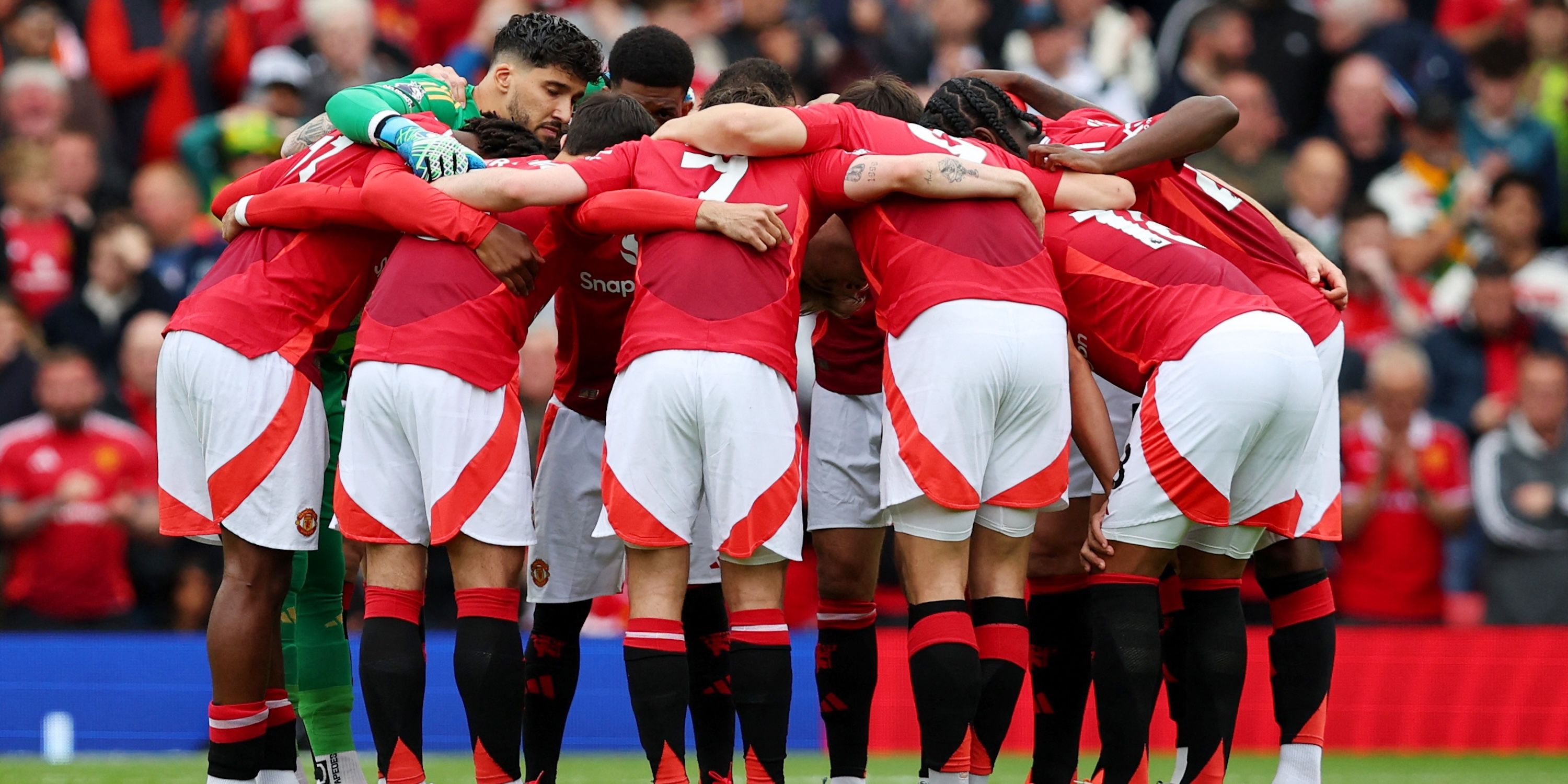 Manchester United players embraced before the match