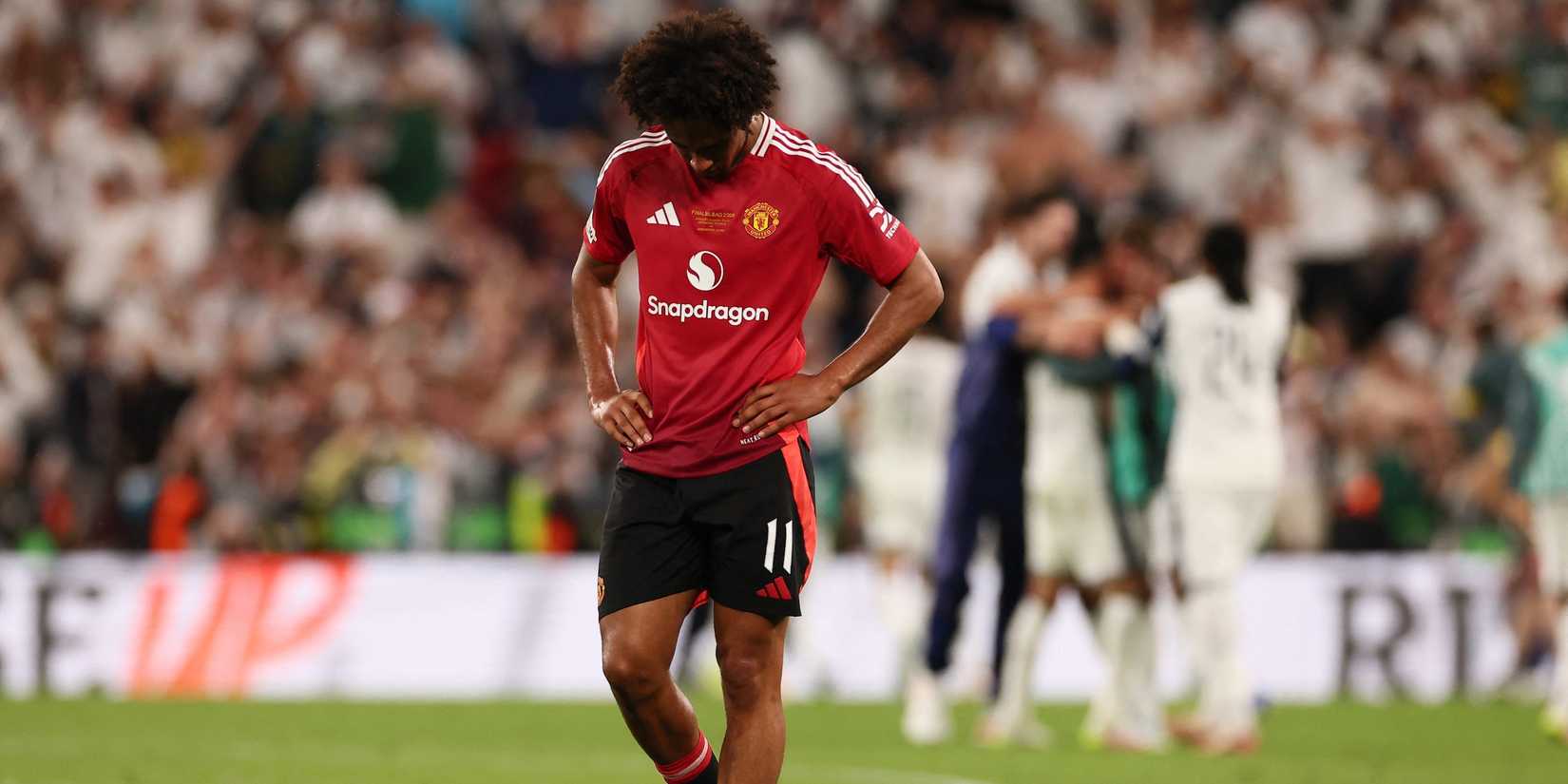 Manchester United's Joshua Zirkzee looks dejected after the match
