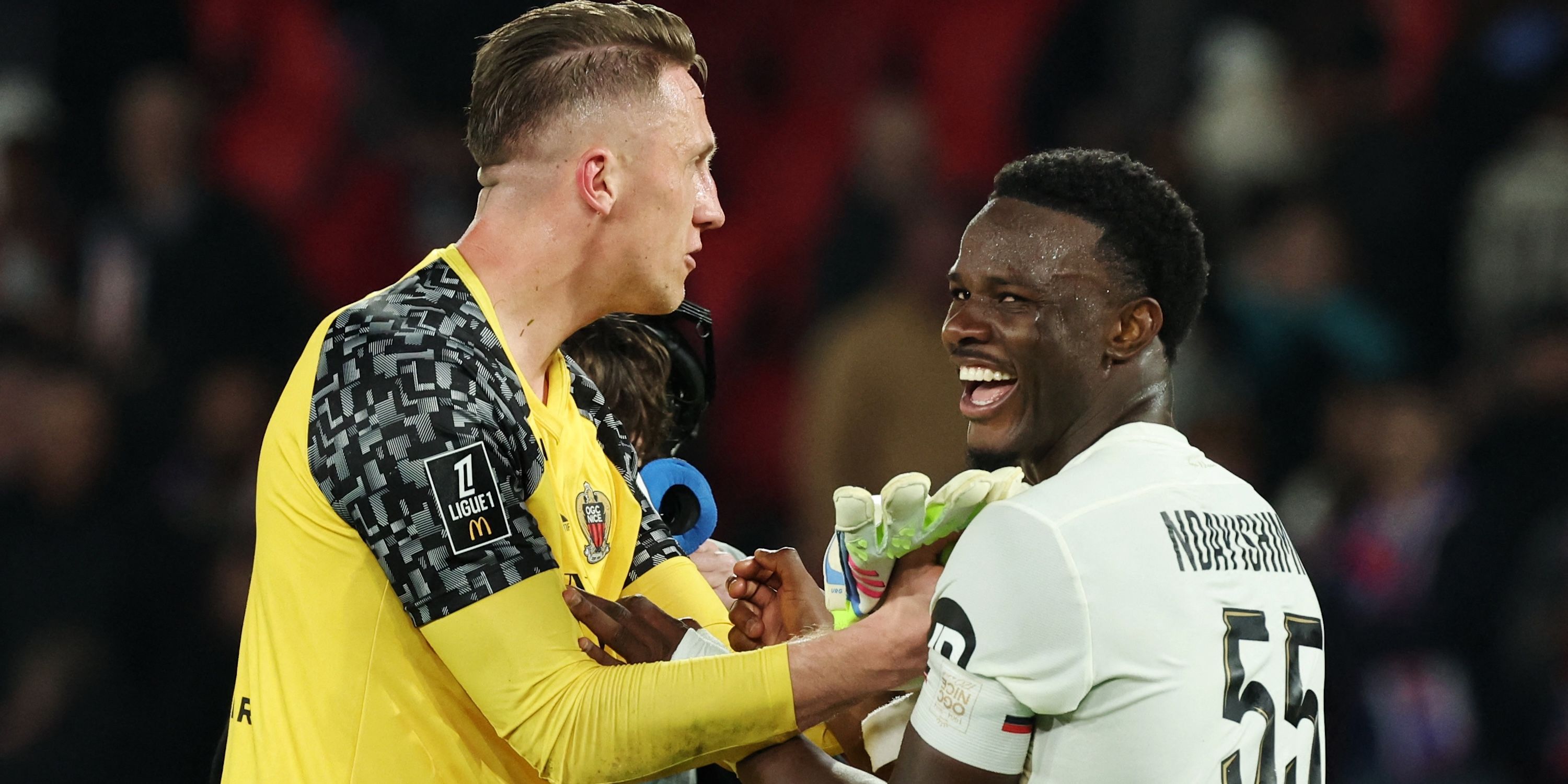 OGC Nice's Marcin Bulka and Youssouf Ndayishimiye Celebrate After the Match