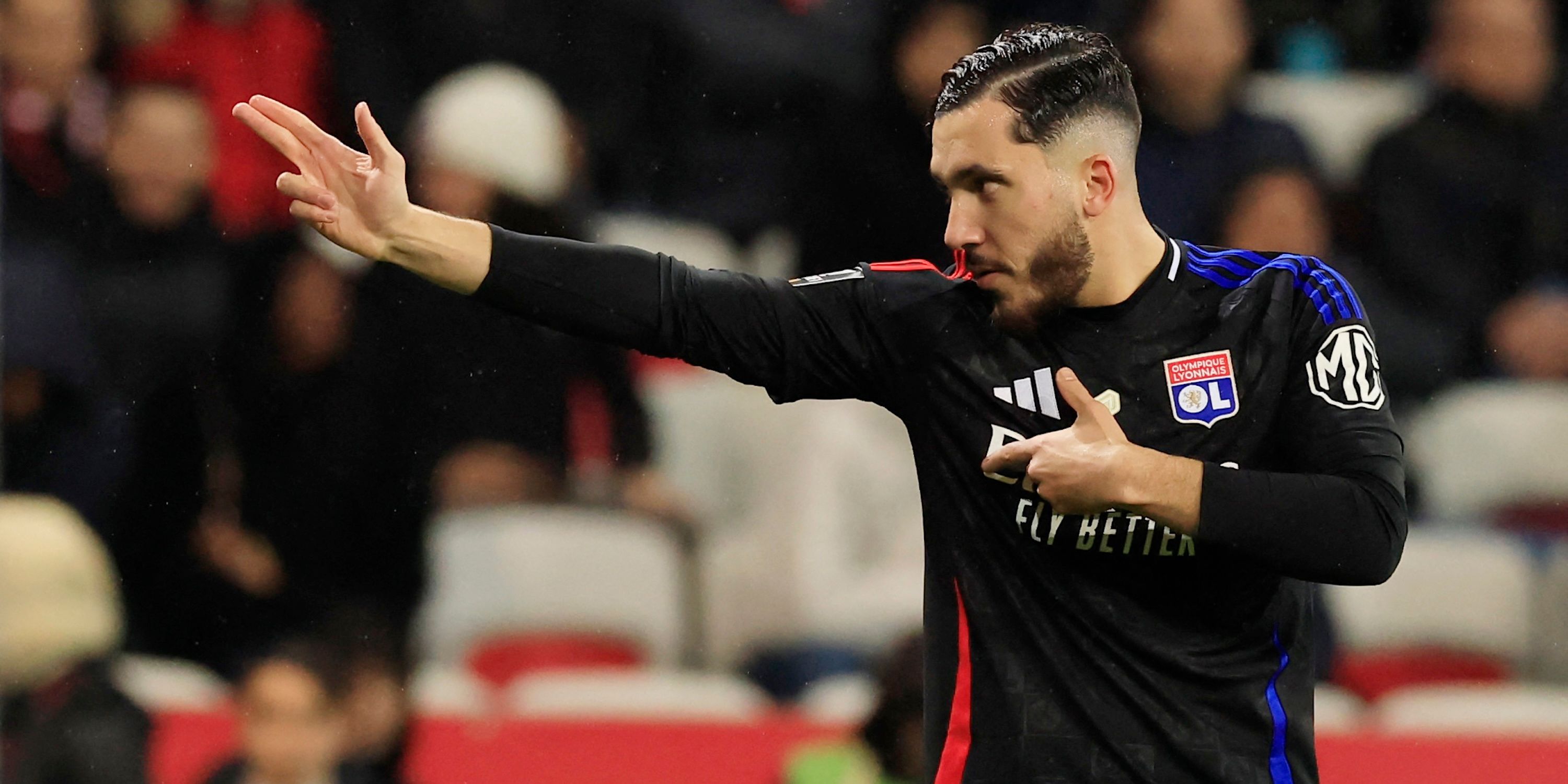Olympique Leonis Ryan Cherke celebrates the score of their first goal