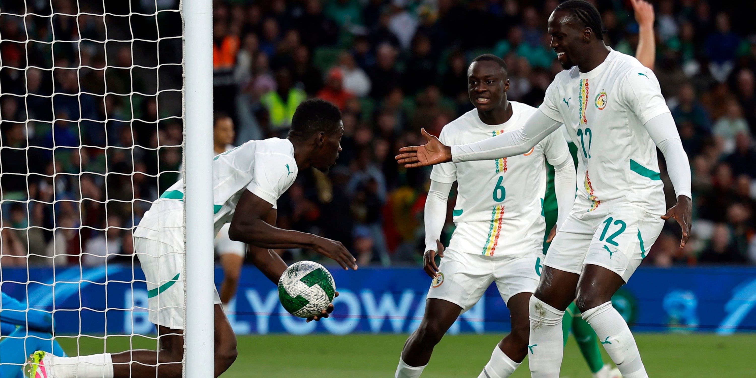 Ismaila Sarr of Senegal famous with Habib Diarra and Cherif Ndiaye after scoring their first goal