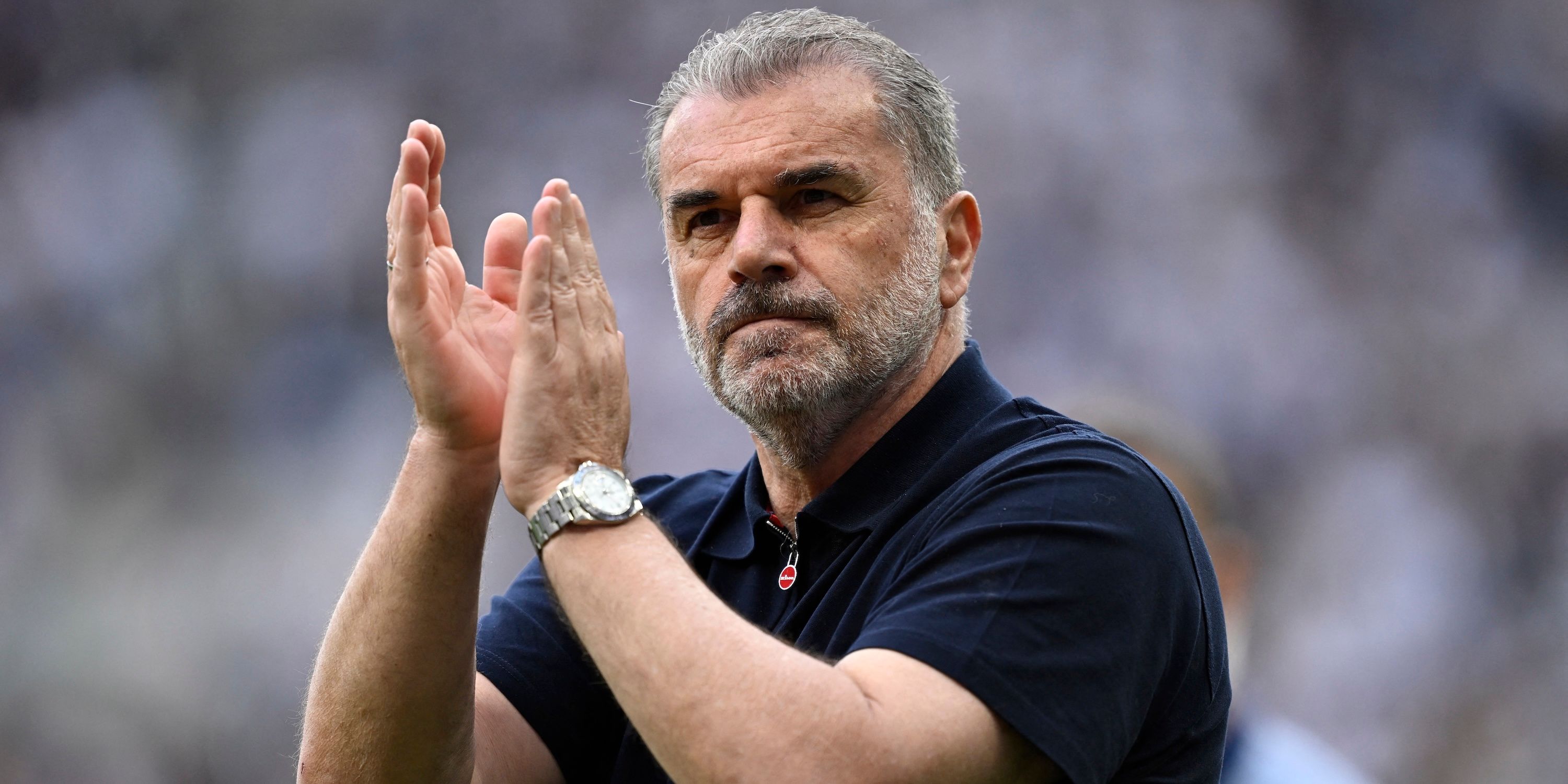 Tottenham Hotspur manager Ange Postecoglu applauds fans after the game