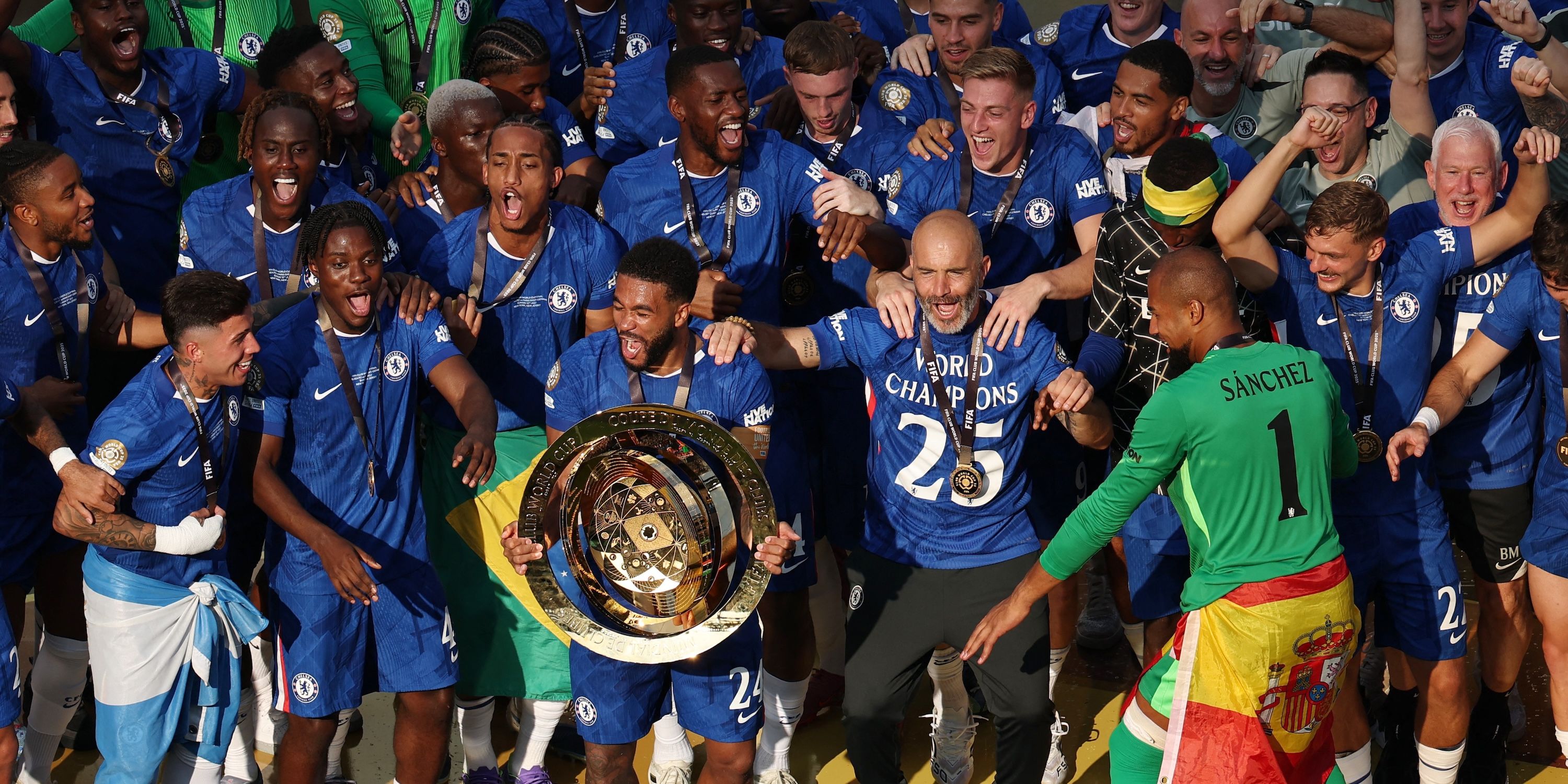 Chelsea's Reece James lifts the trophy as he celebrates with Chelsea manager Enzo Maresca and teammates after winning the FIFA Club World Cup