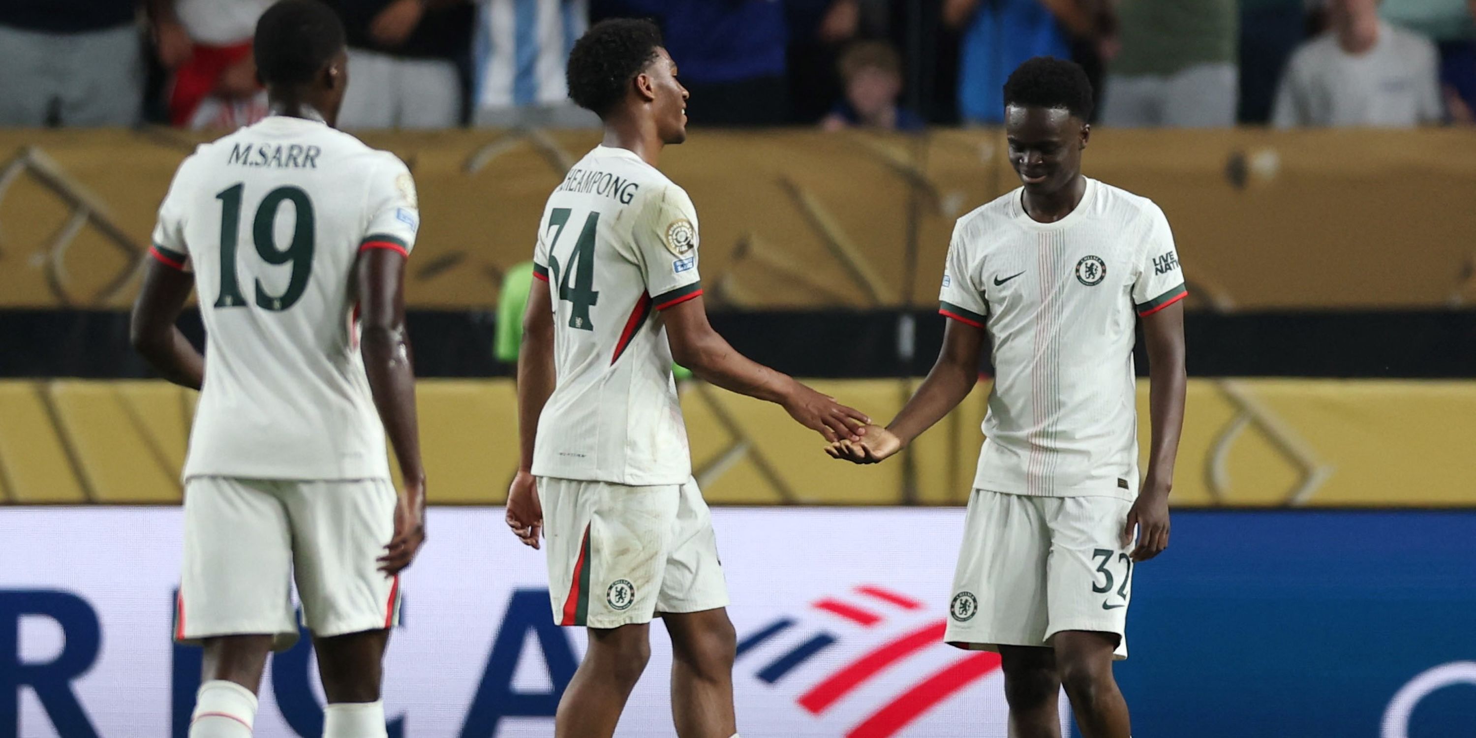 Chelsea's Tyrique George celebrates scoring their third goal with Josh Acheampong
