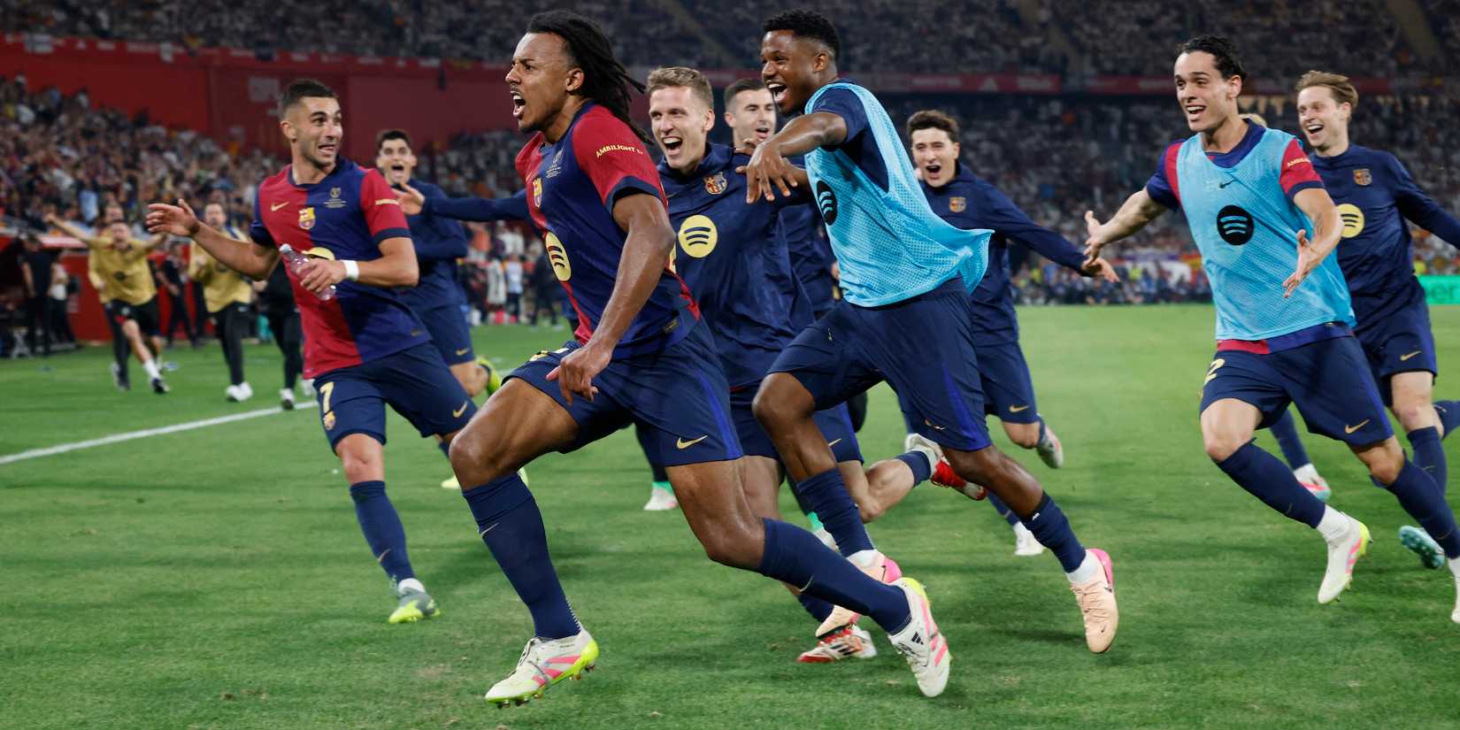 FC Barcelona's Jules Kounde celebrates scoring their third goal with teammates