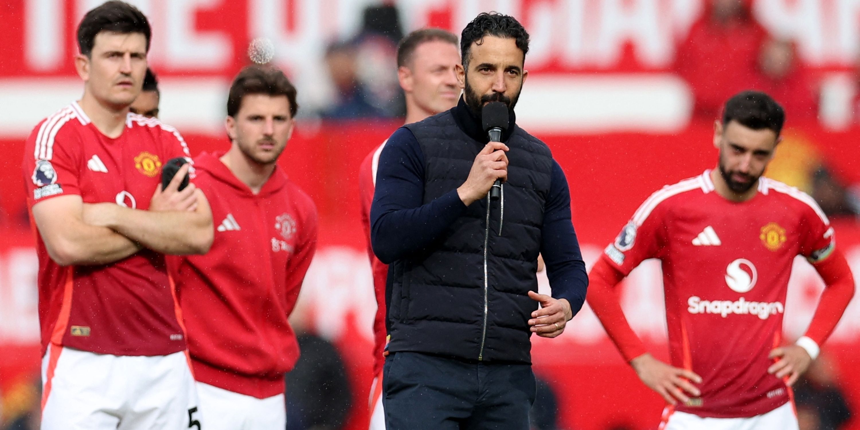 Manchester United manager Ruben Amorim talks to the fans after the match