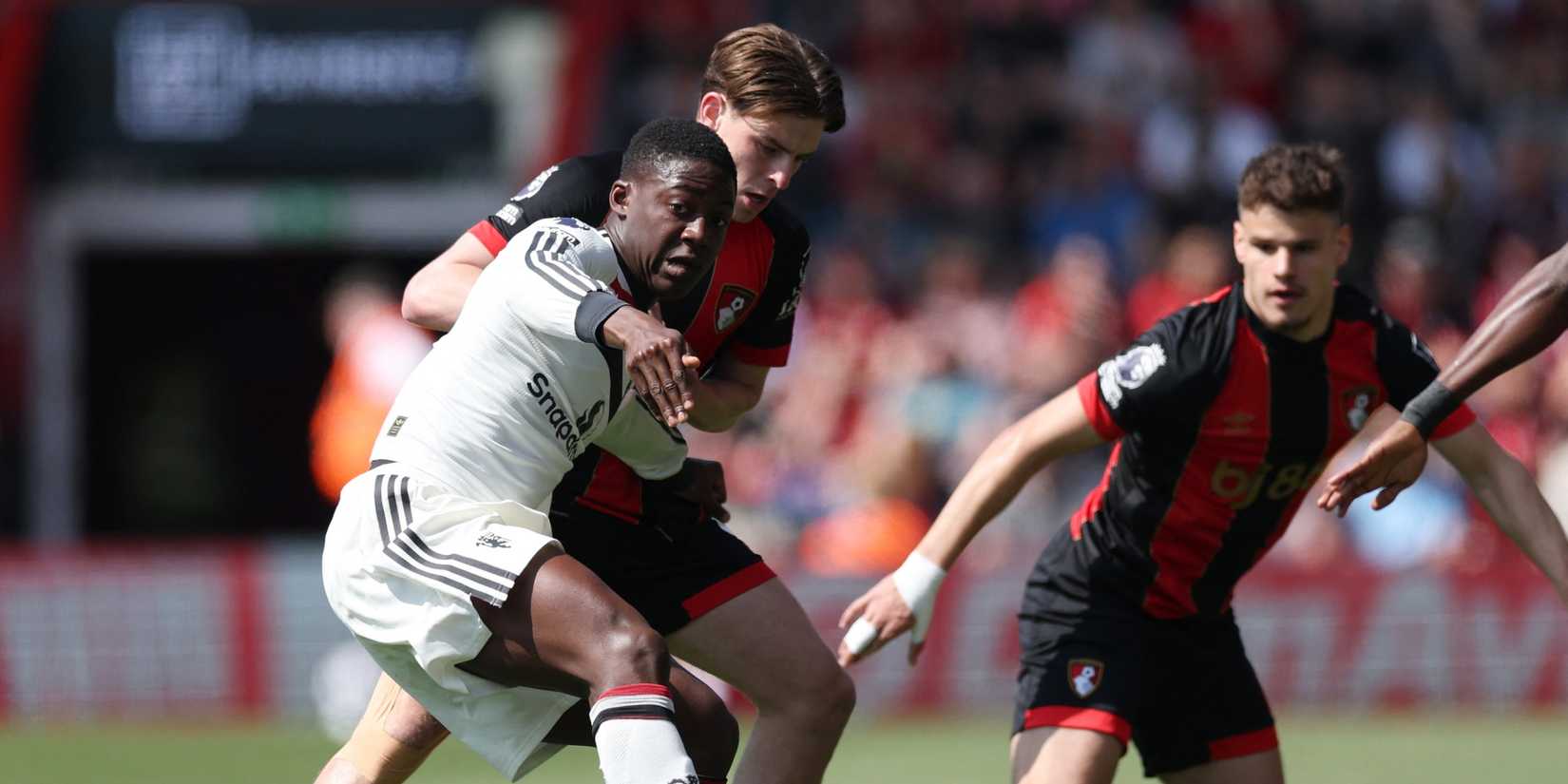 Manchester United Main Kobbie in action with Alex Scott from AFC Bournemouth 