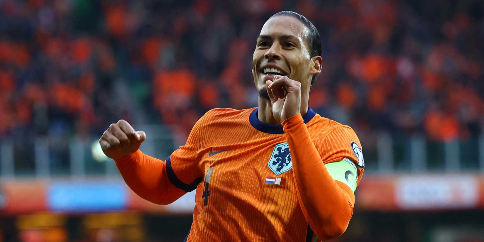 Netherlands' Virgil van Dijk celebrates scoring their third goal