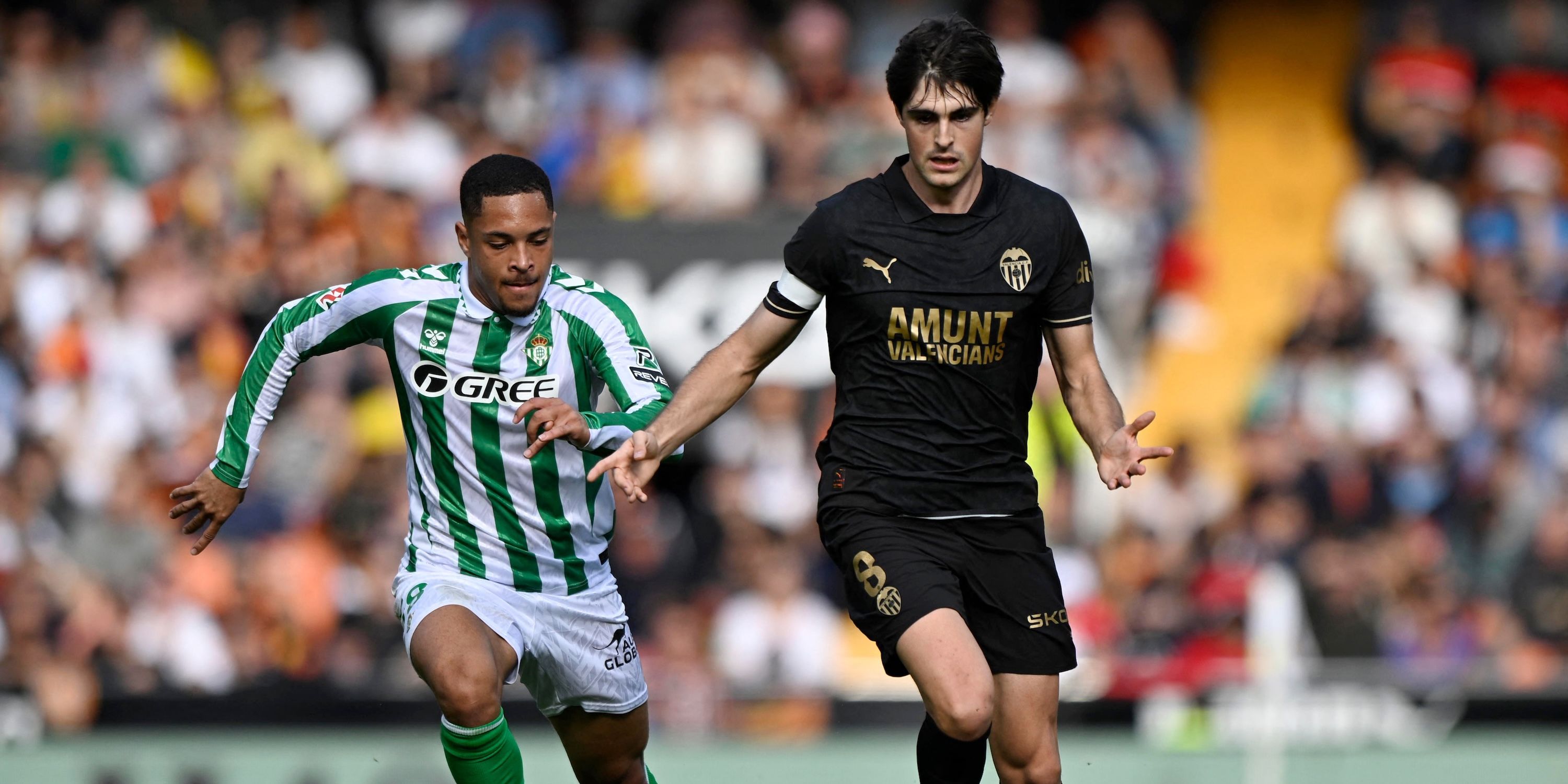 Real betis' Vititor Ritoror with Valentici Javig