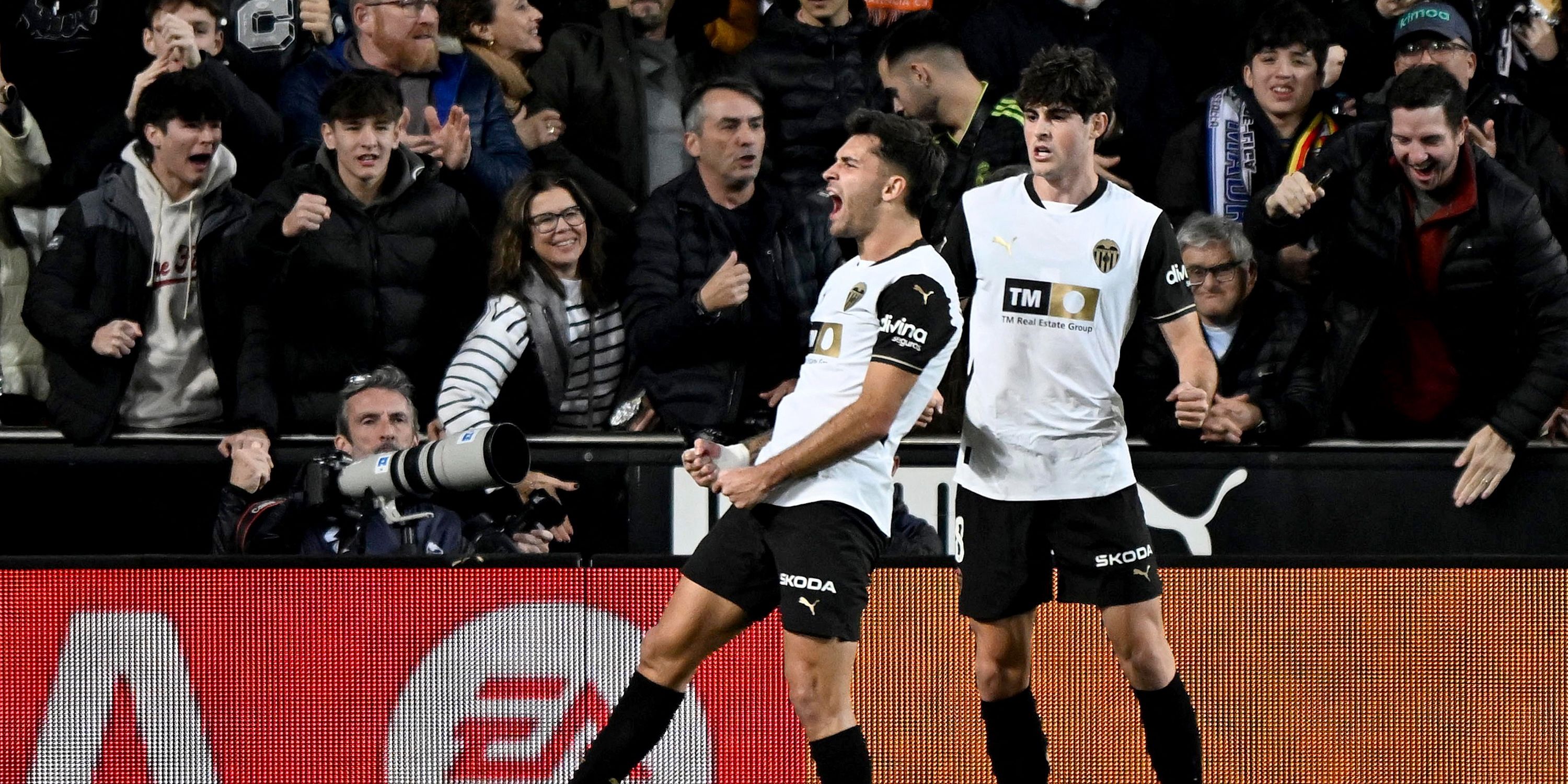 Valencia's Hugo Duro celebrates with Javi Guerra after scoring their first goal