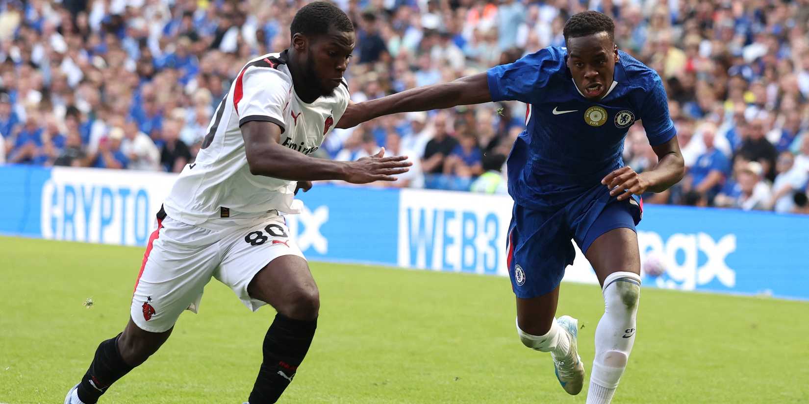 Chelsea's Jamie Gittens in action with AC Milan's Yunus Musah
