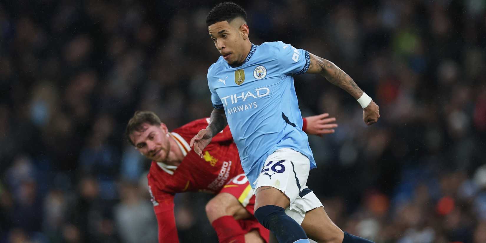 Manchester City's Savinho in action with Liverpool's Alexis Mac Allister
