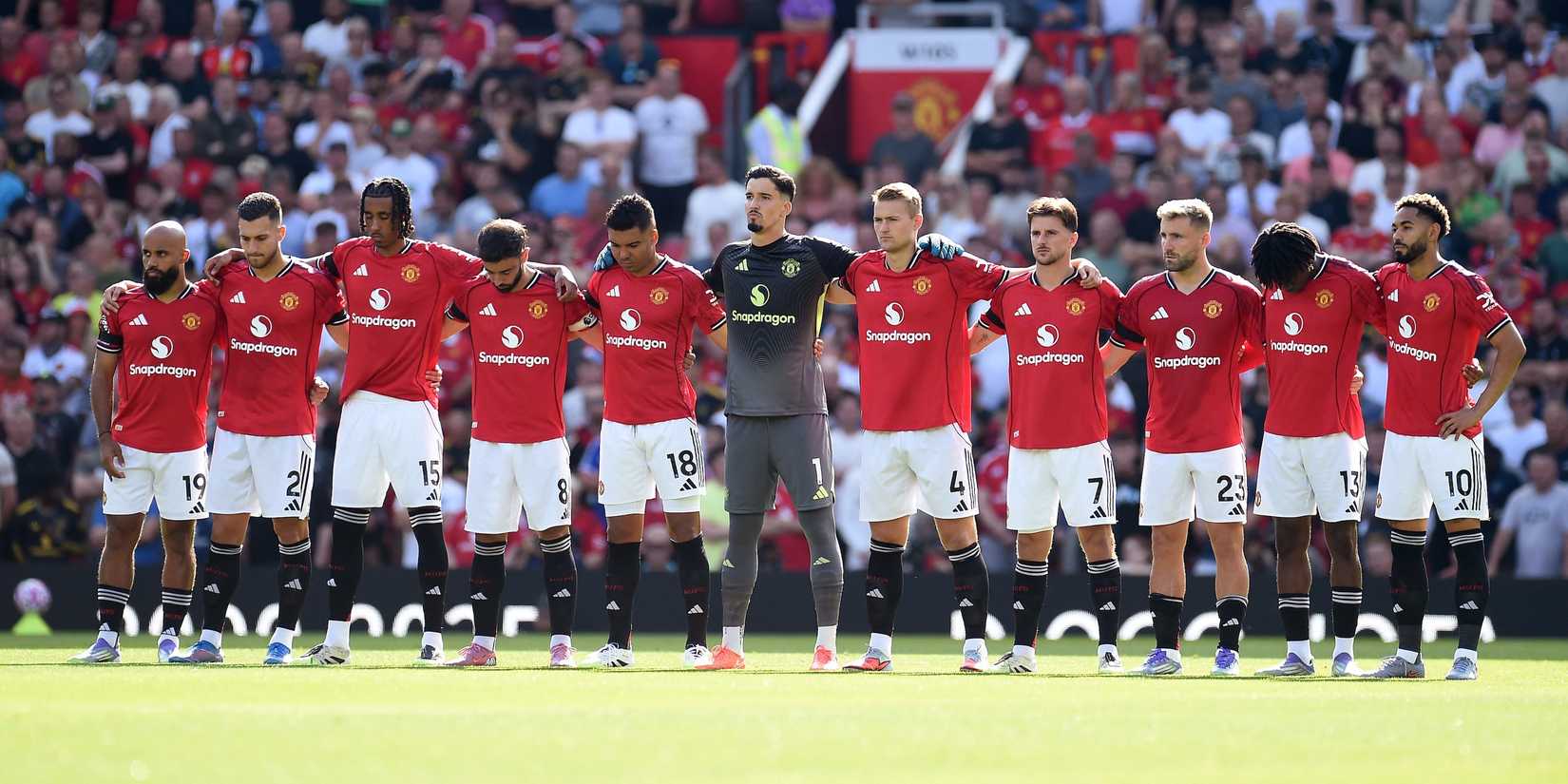 Manchester United players during a minutes silence