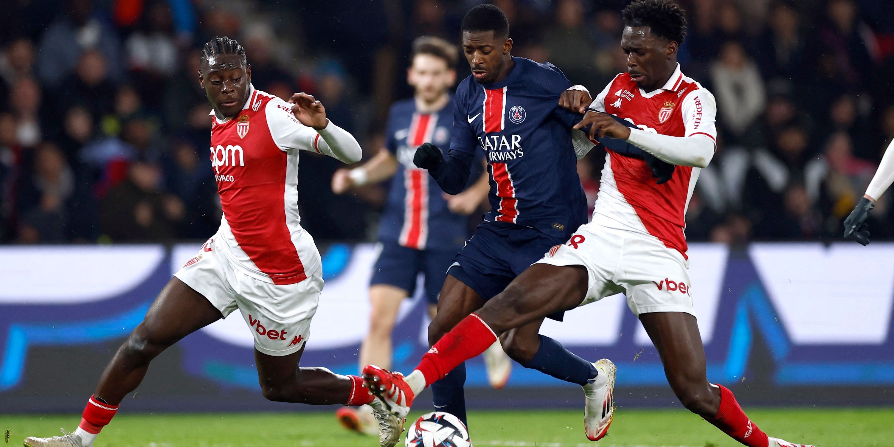 Paris St Germain's Ousmane Dembele in action with AS Monaco's Soungoutou Magassa