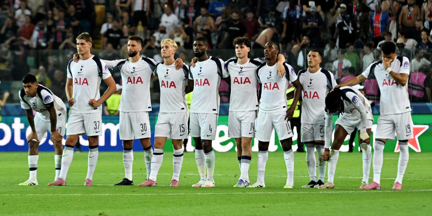 Tottenham Hotspur players line up during the penalty shootout