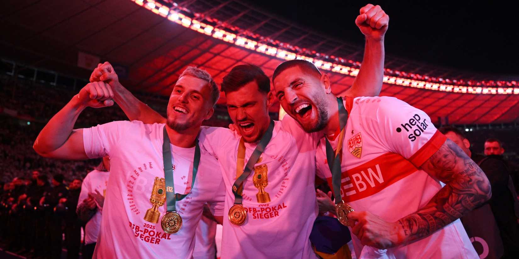 VFB Stuttgart's Jeff Chabot and VFB Stuttin Demirevic and VFB Stuttgart Pascal Sinzil after winning the DFB Cup final