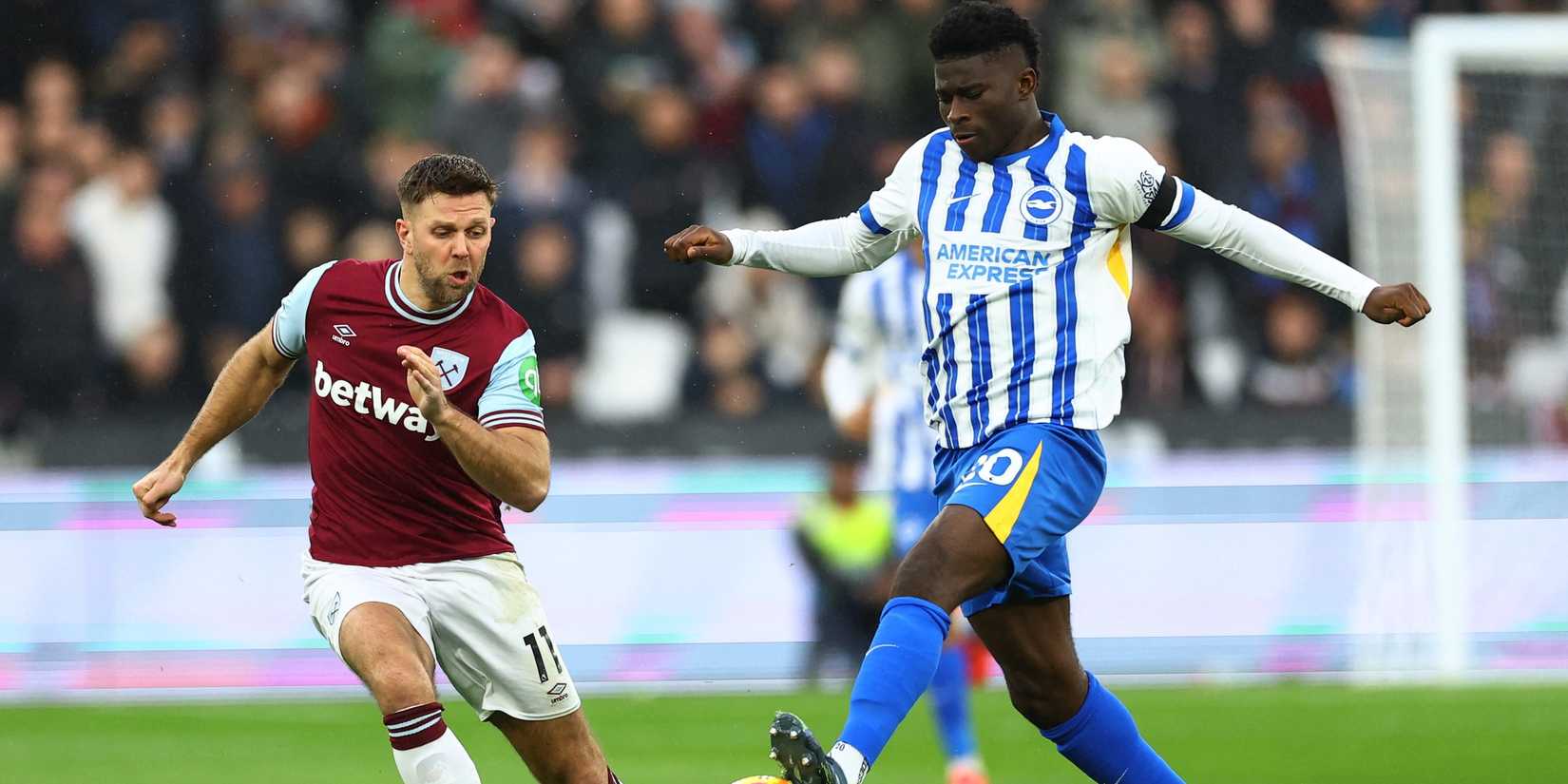 West Ham United's Niclas Fullkrug in action with Brighton & Hove Albion's Carlos Baleba