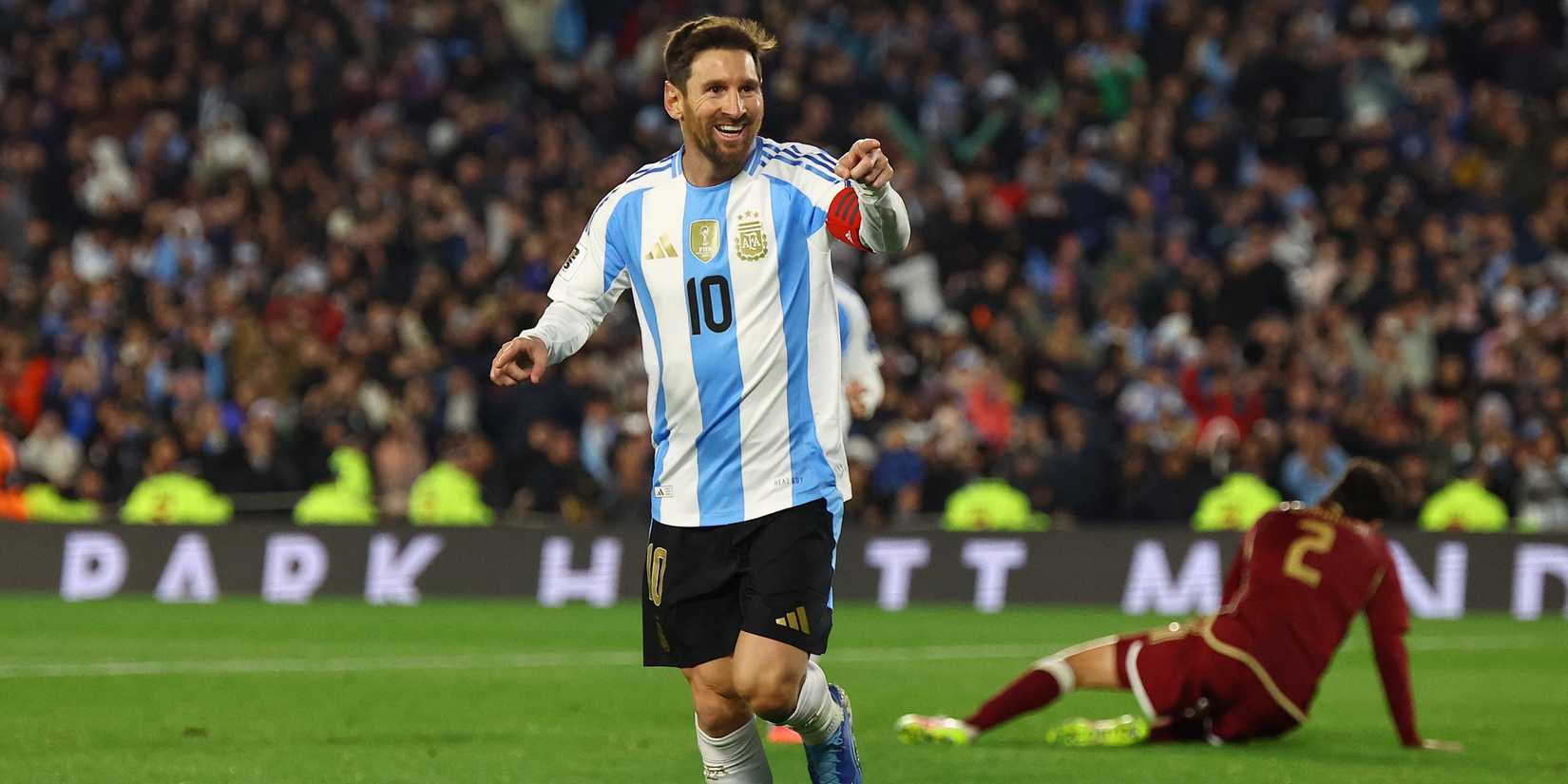 Argentina's Lionel Messi celebrates scoring their third goal