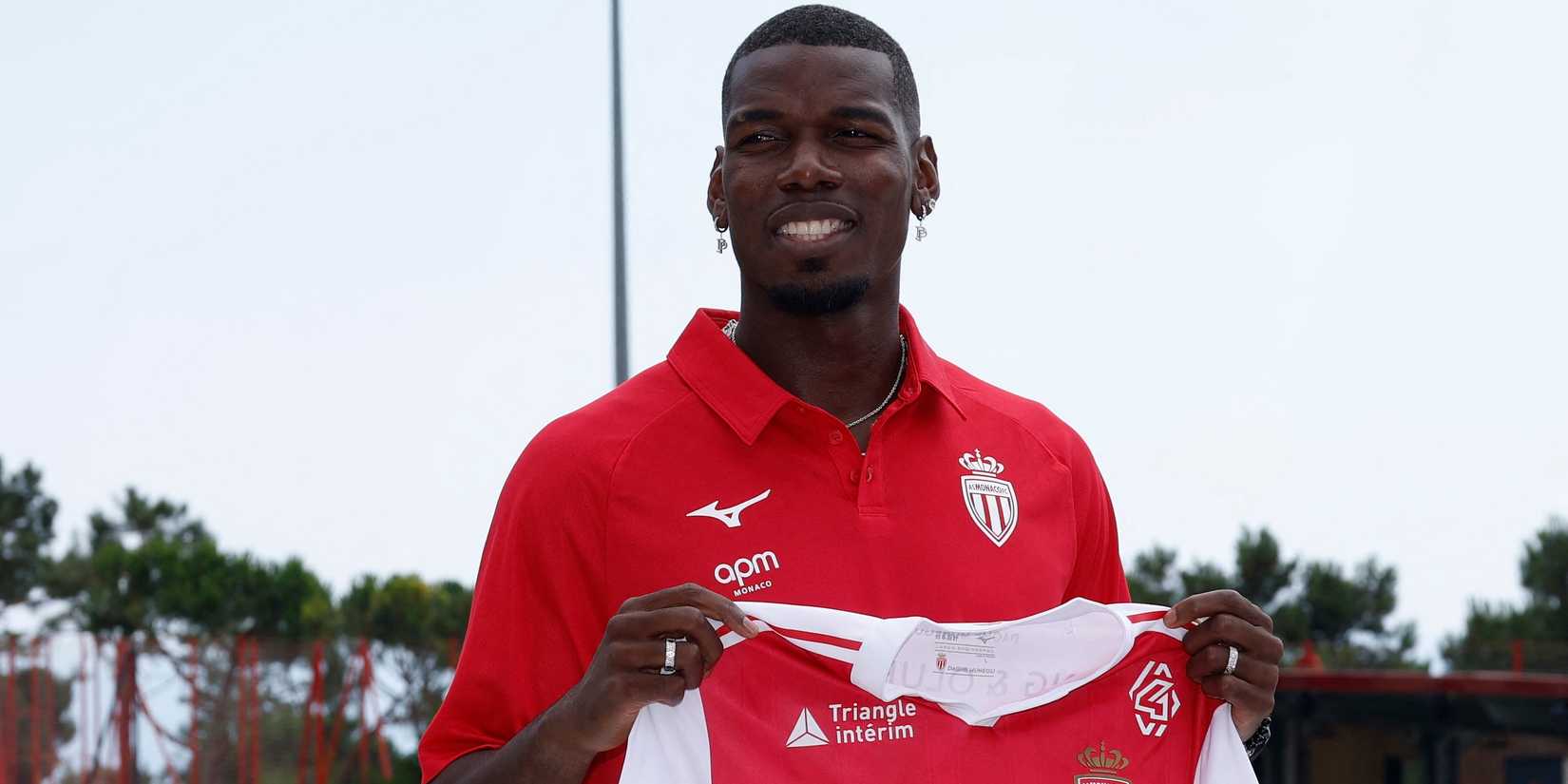 Monaco also puts Paul Pogba's signature with his shirt while uncovering the niqab