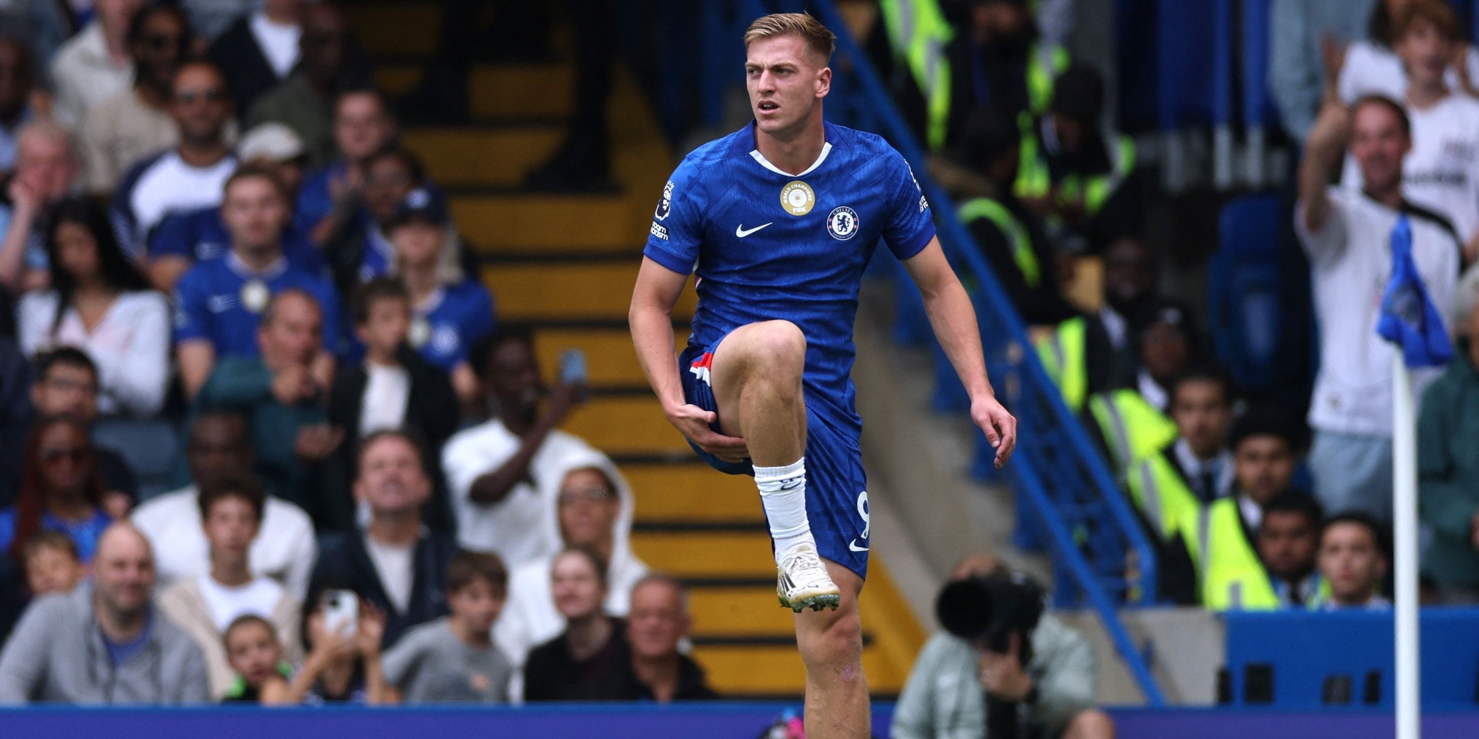Chelsea's Liam Delap reacts after sustaining an injury 