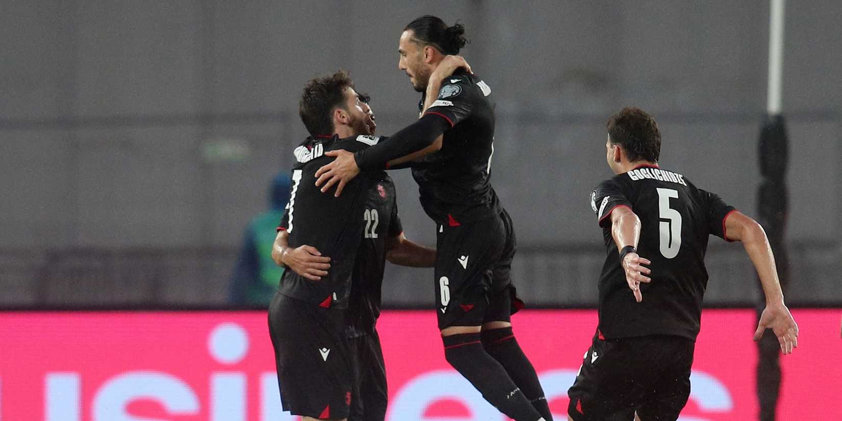 Georgia's Georges Mikautadze celebrates scoring their third goal with Khvicha Kvaratskhelia, Giorgi Kochorashvili and Saba Goglichidze REUTERS:Irakli Gedenidze