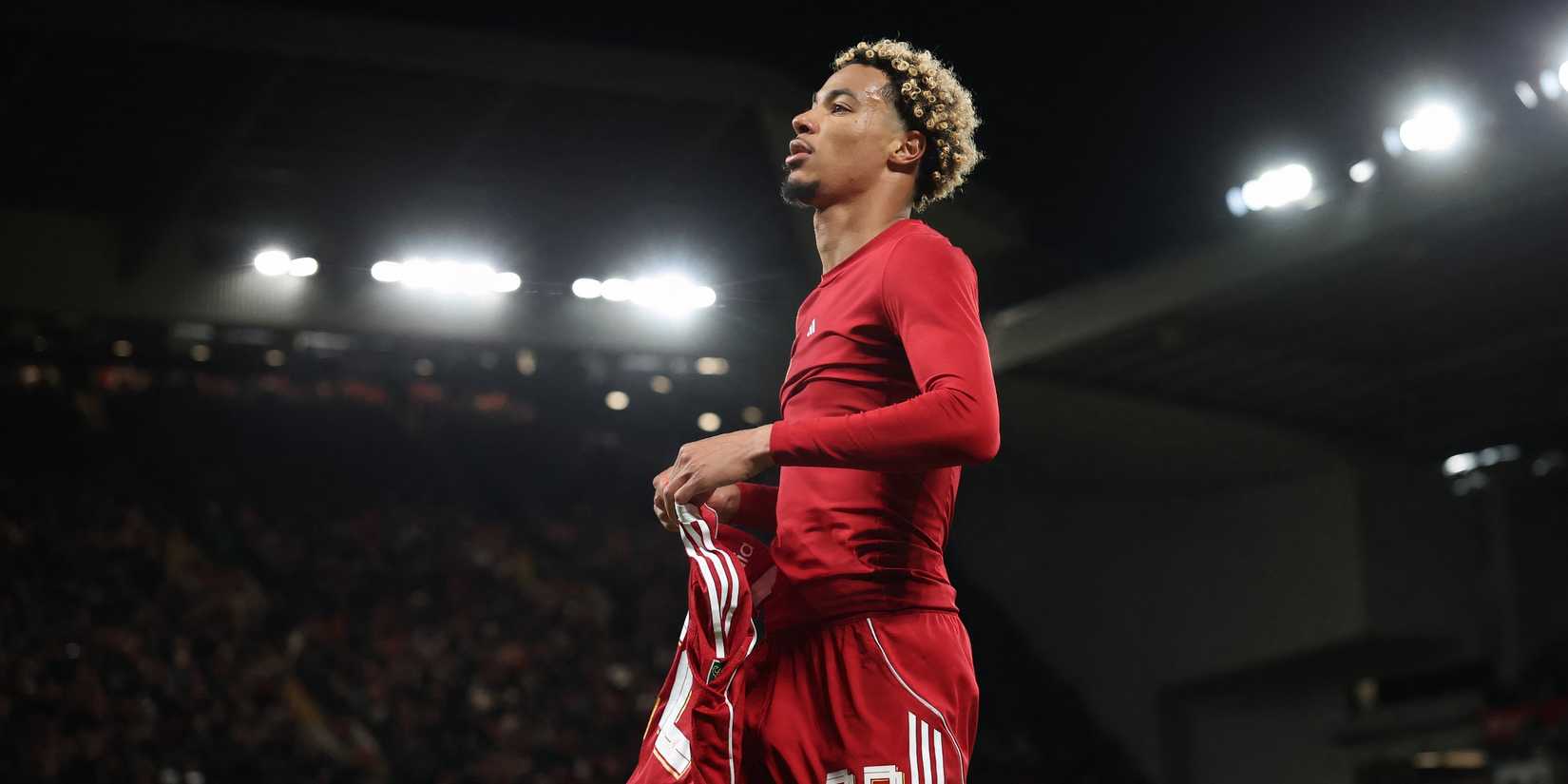 Hugo Ekitiki celebrates in a Liverpool shirt