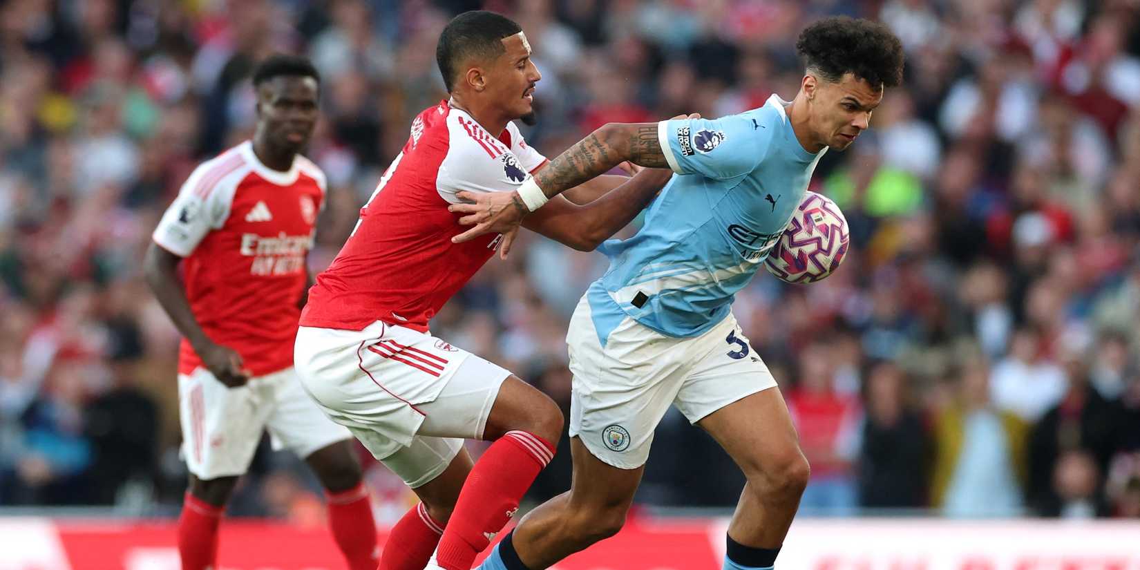 Niko Aurelli from Manchester City with William Saliba from Arsenal