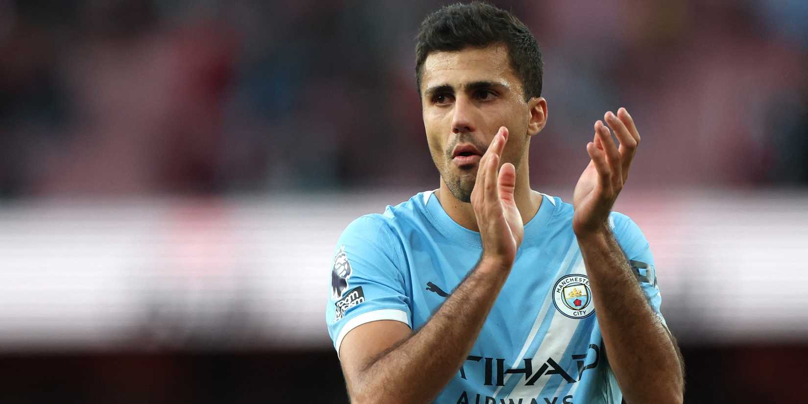 Manchester City Rodri applauds fans after the match