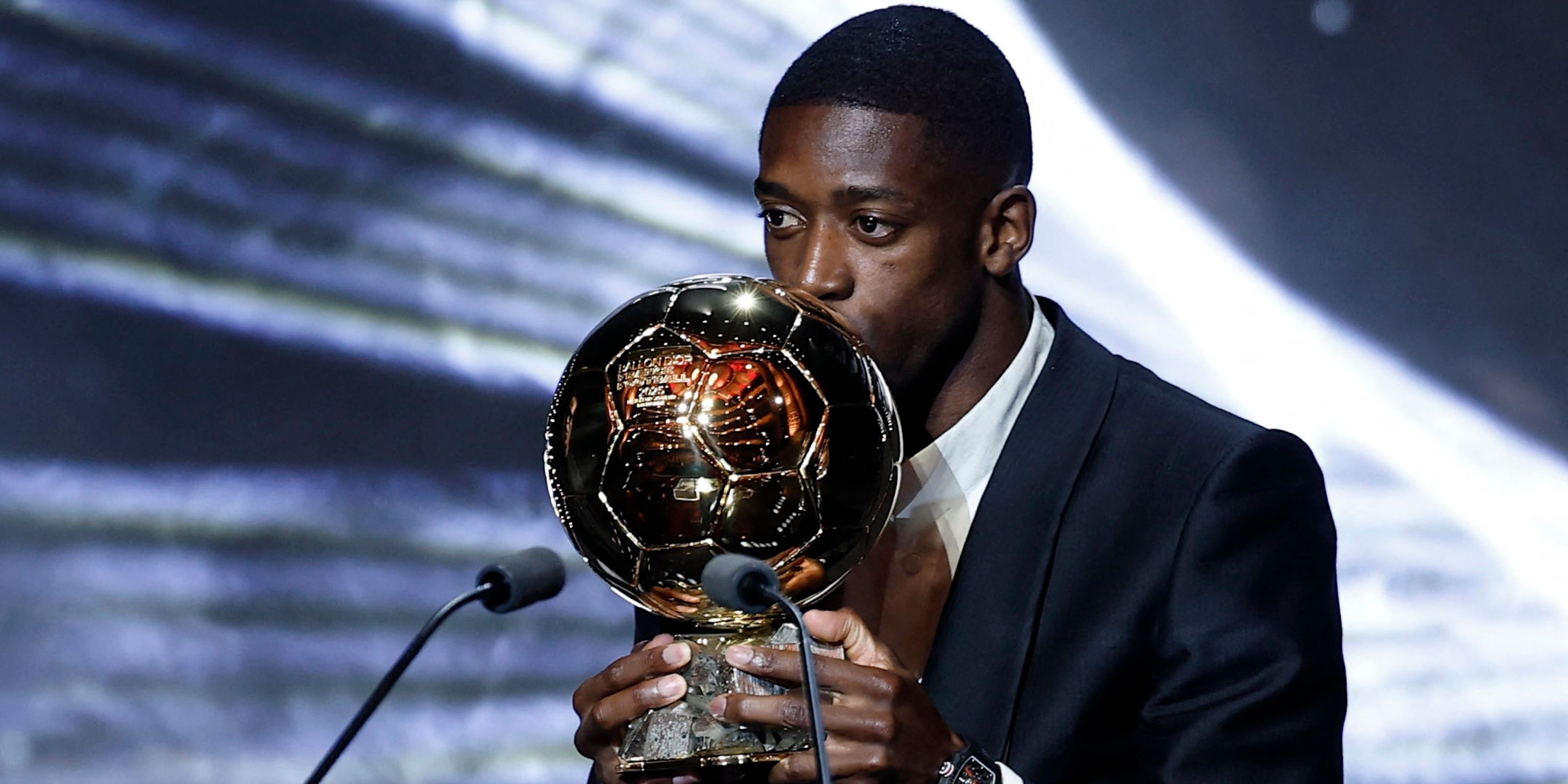 Paris St Germain's Ousmane Dembele celebrates after winning the men's Ballon d'Or award
