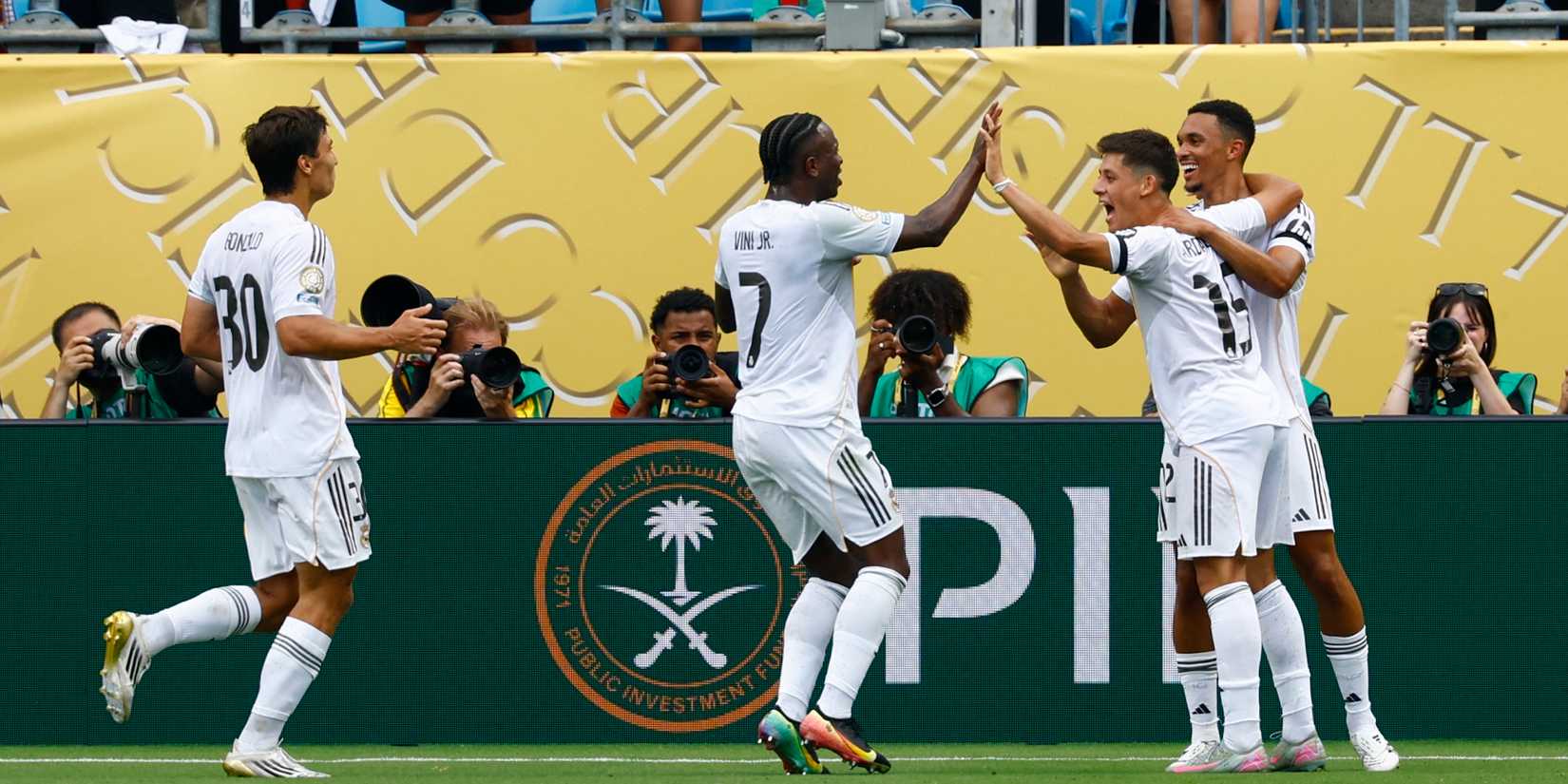 Real Madrid's Arda Guler celebrates scoring their second goal with Trent Alexander-Arnold, Vinicius Junior and Gonzalo Garcia