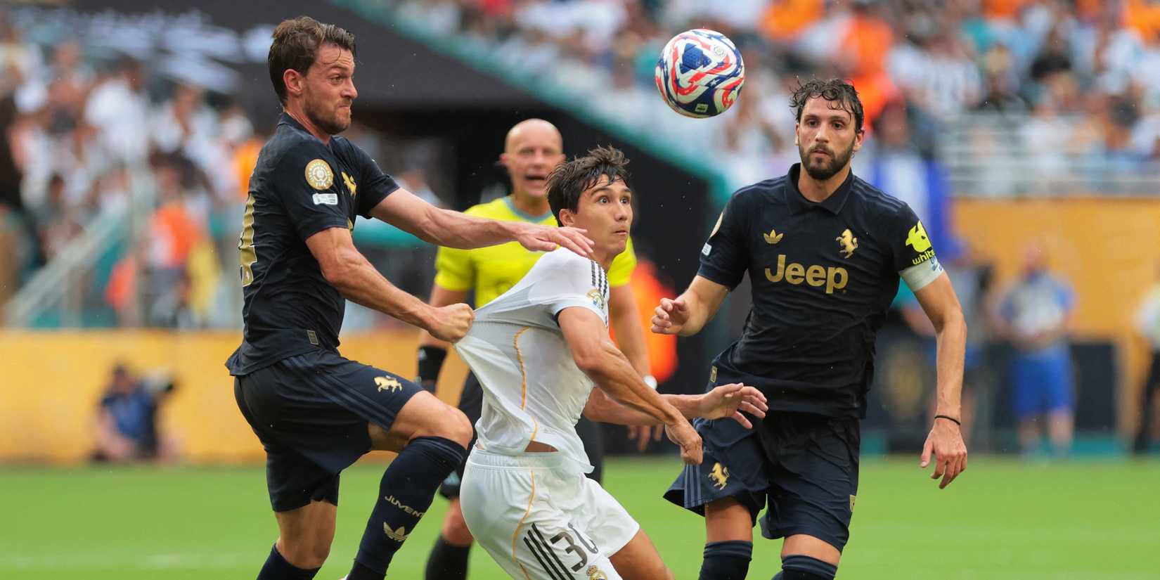 Real Madrid's Gonzalo Garcia in action with Juventus' Daniele Rugani and Manuel Locatelli 