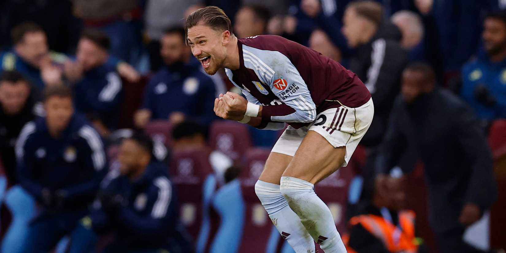 Aston Villa's Matty Cash celebrates after the match