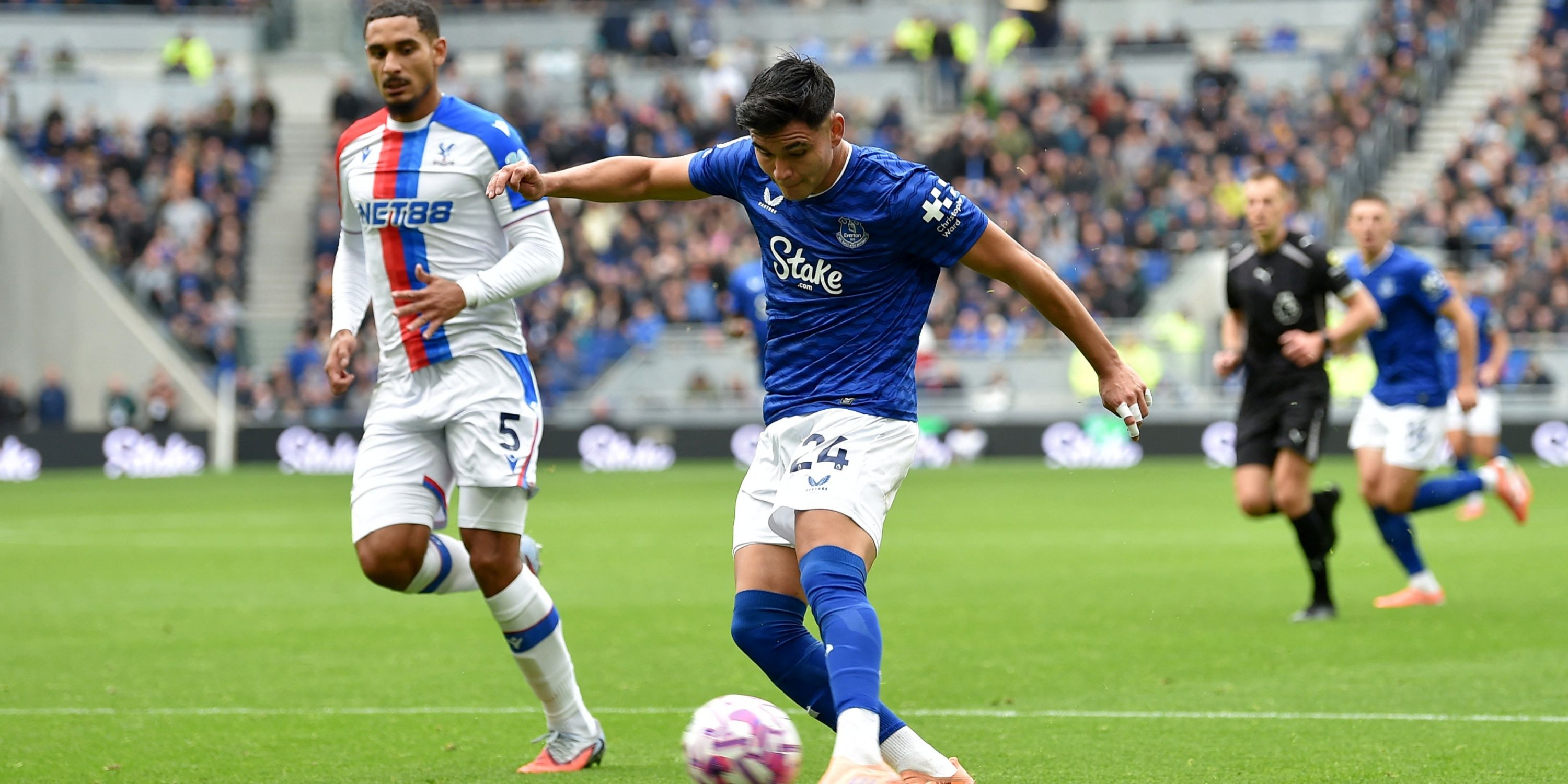 Charly Alcaraz in action for Everton, eyes fixed on the ball.