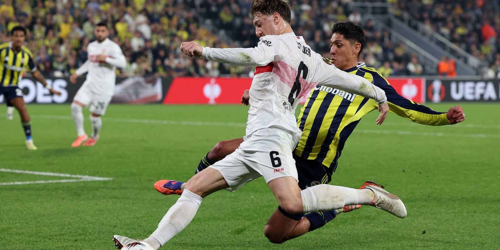  Fenerbahce's Edson Alvarez in action with VfB Stuttgart's Angelo Stiller