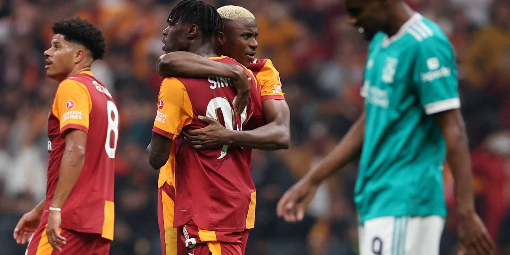 Galatasaray players Victor Osimhen and Wilfried Singo celebrate after the match