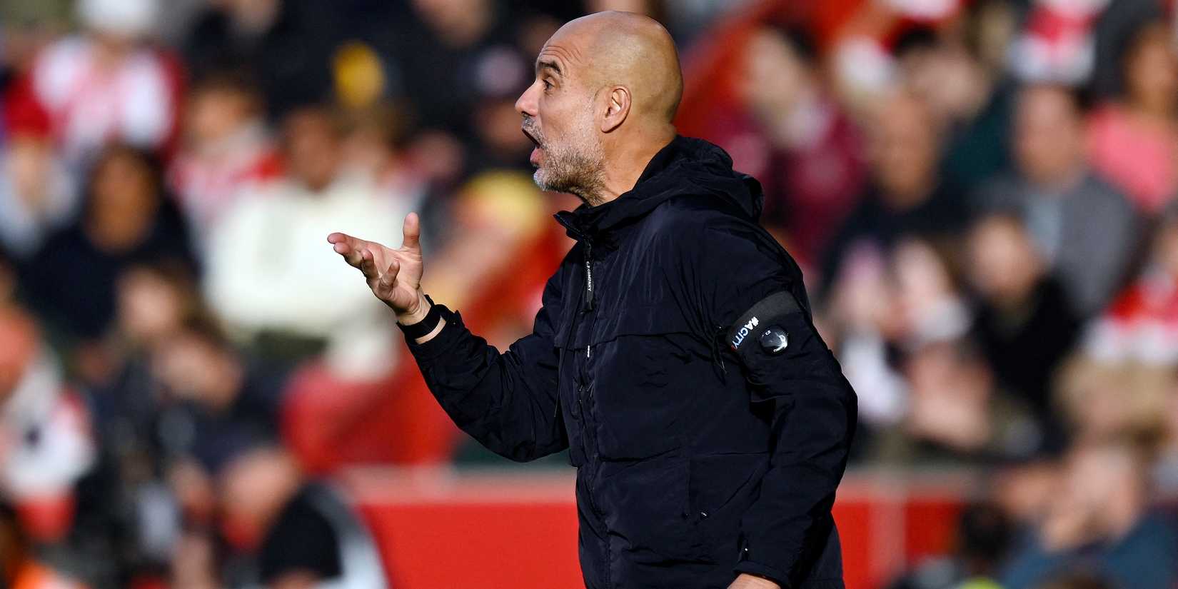 Manchester City manager Pep Guardiola reacts-1