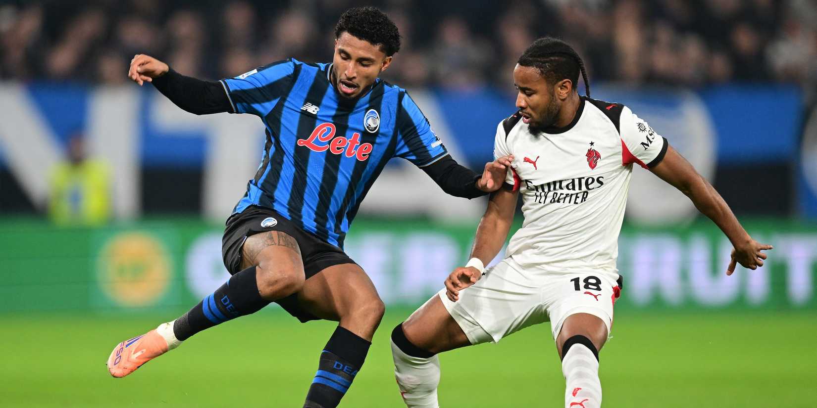 AC Milan's Christopher Nkunku in action with Atalanta's Ederson