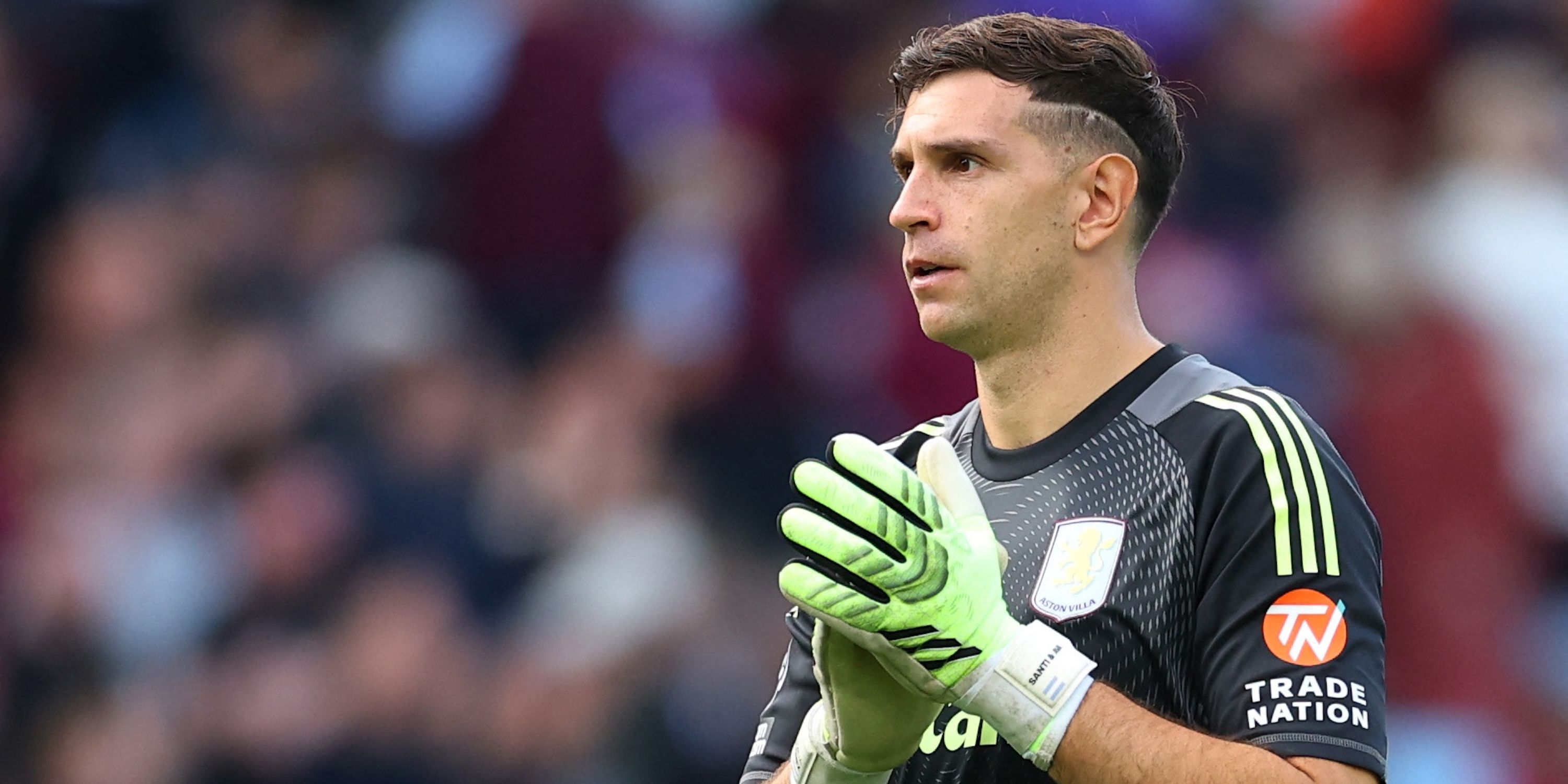 Aston Villa's Emiliano Martinez celebrates after the match 
