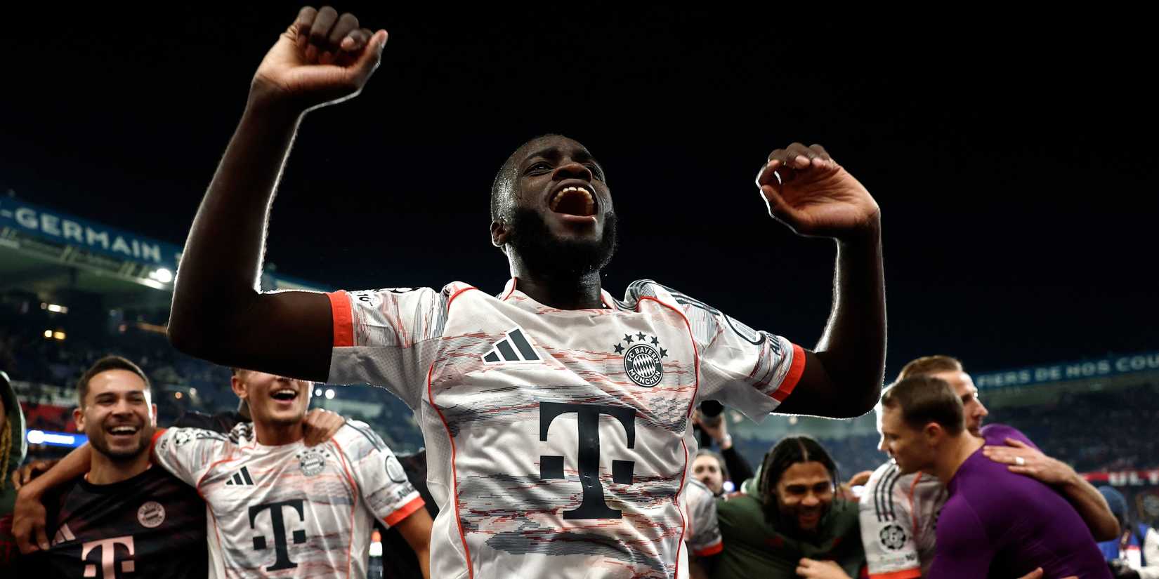 Bayern Munich's Dayot Upamecano and teammates celebrate after the match