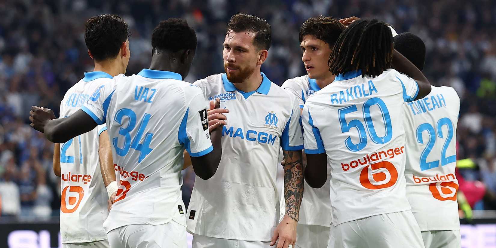 Olympique de Marseille's Robinio Vaz celebrates scoring their fifth goal with teammates