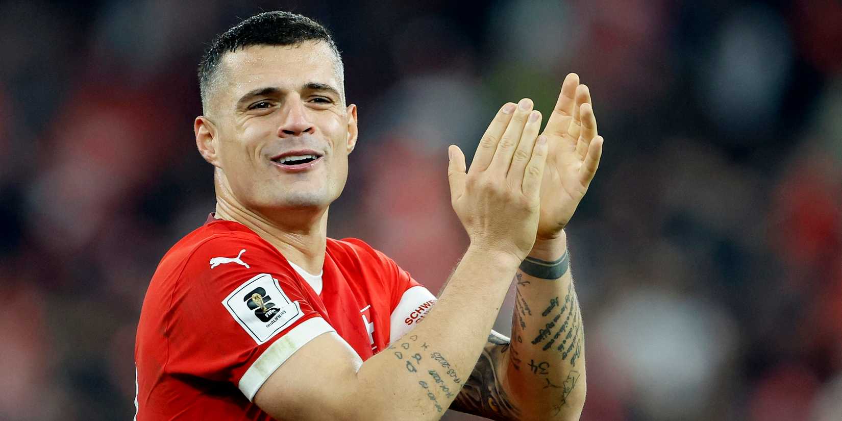 Switzerland's Granit Xhaka applauds fans after the match
