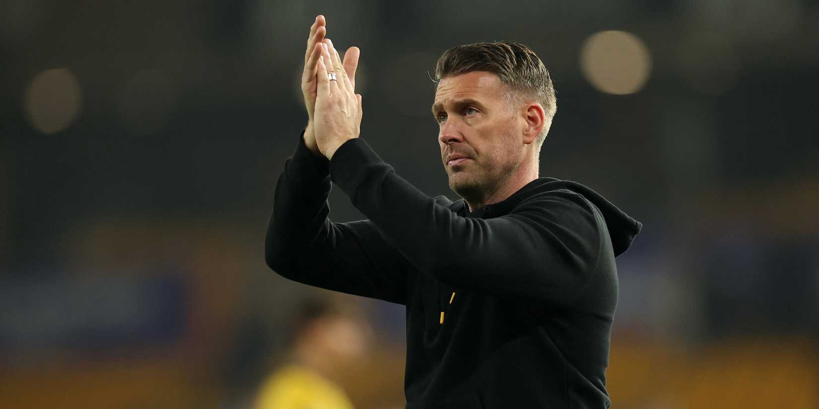 Wolverhampton Wanderers manager Rob Edwards applauds fans after the match